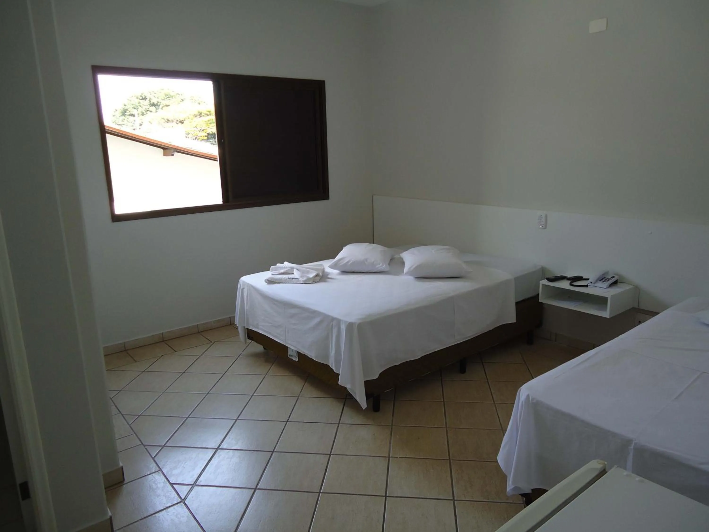 Bed in Big Executive Hotel