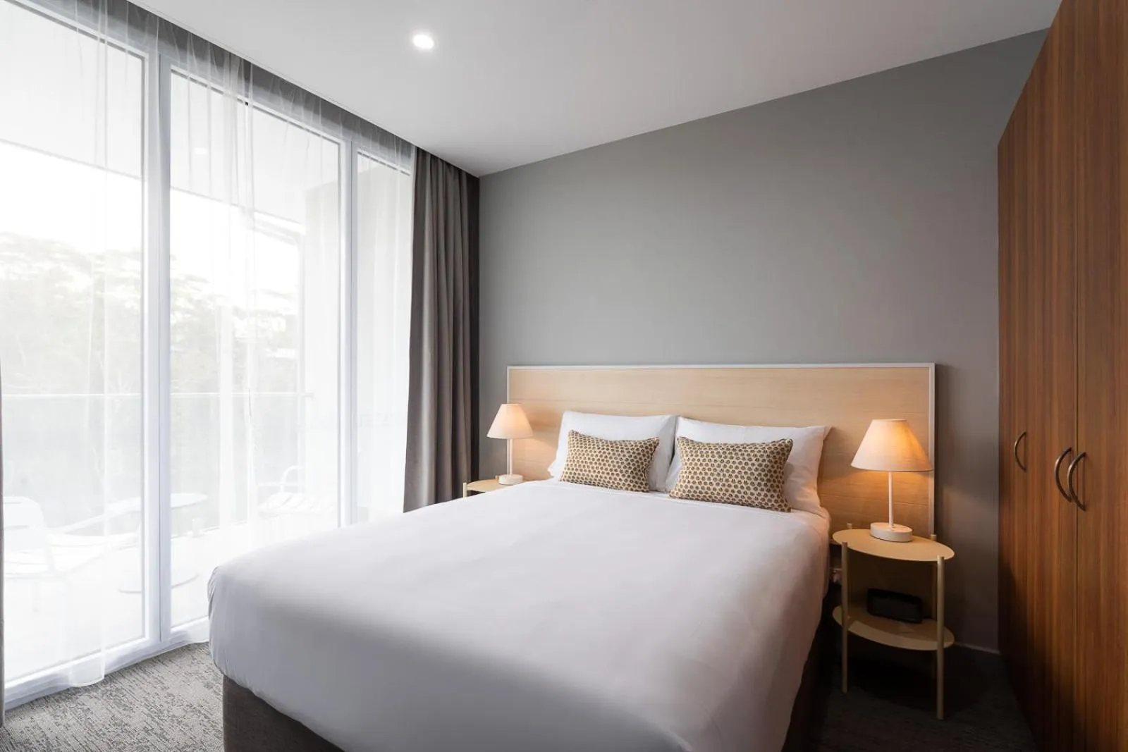 Bed in Abode Malua Bay