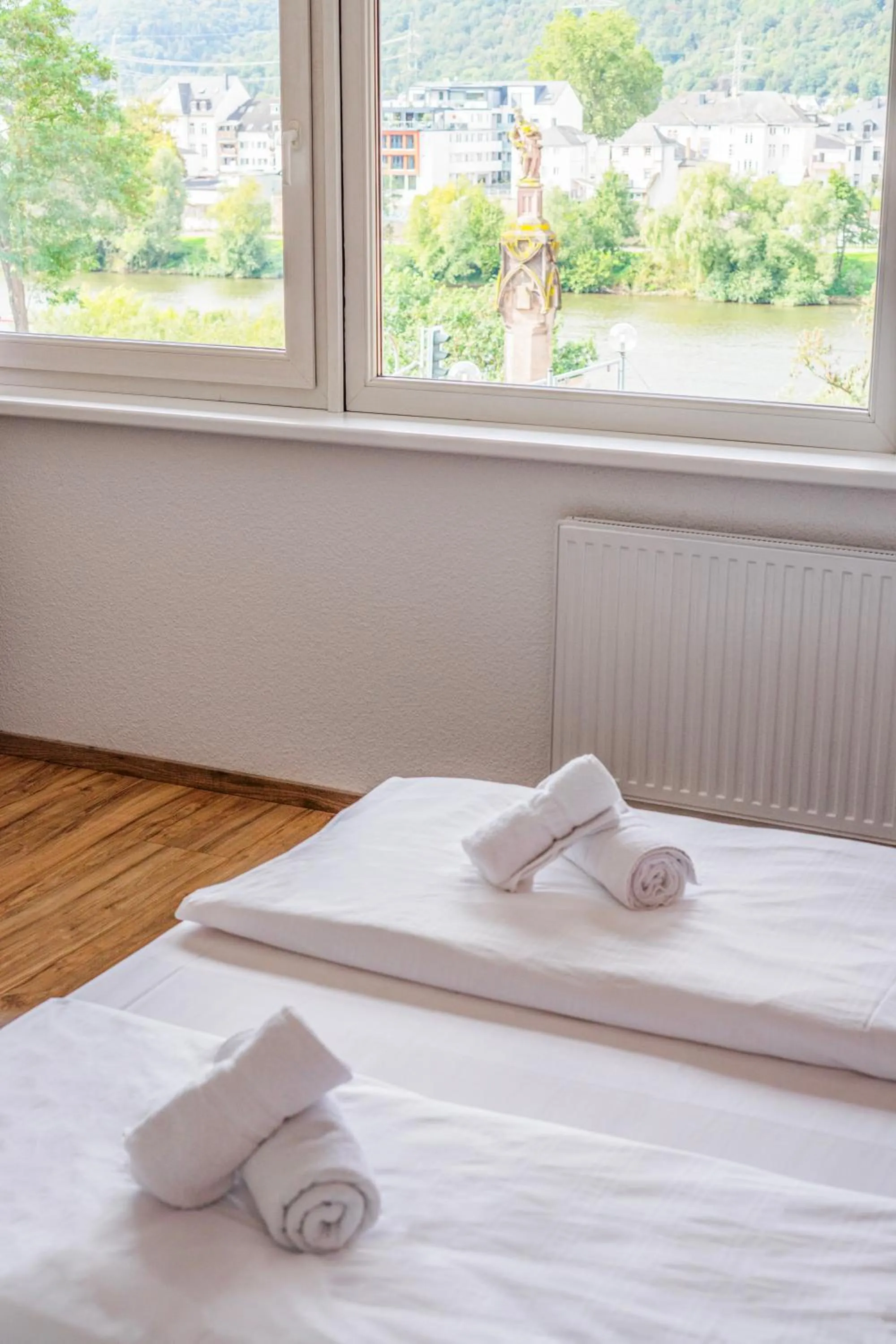 Bed in Self-Check-In Hotel Constantin