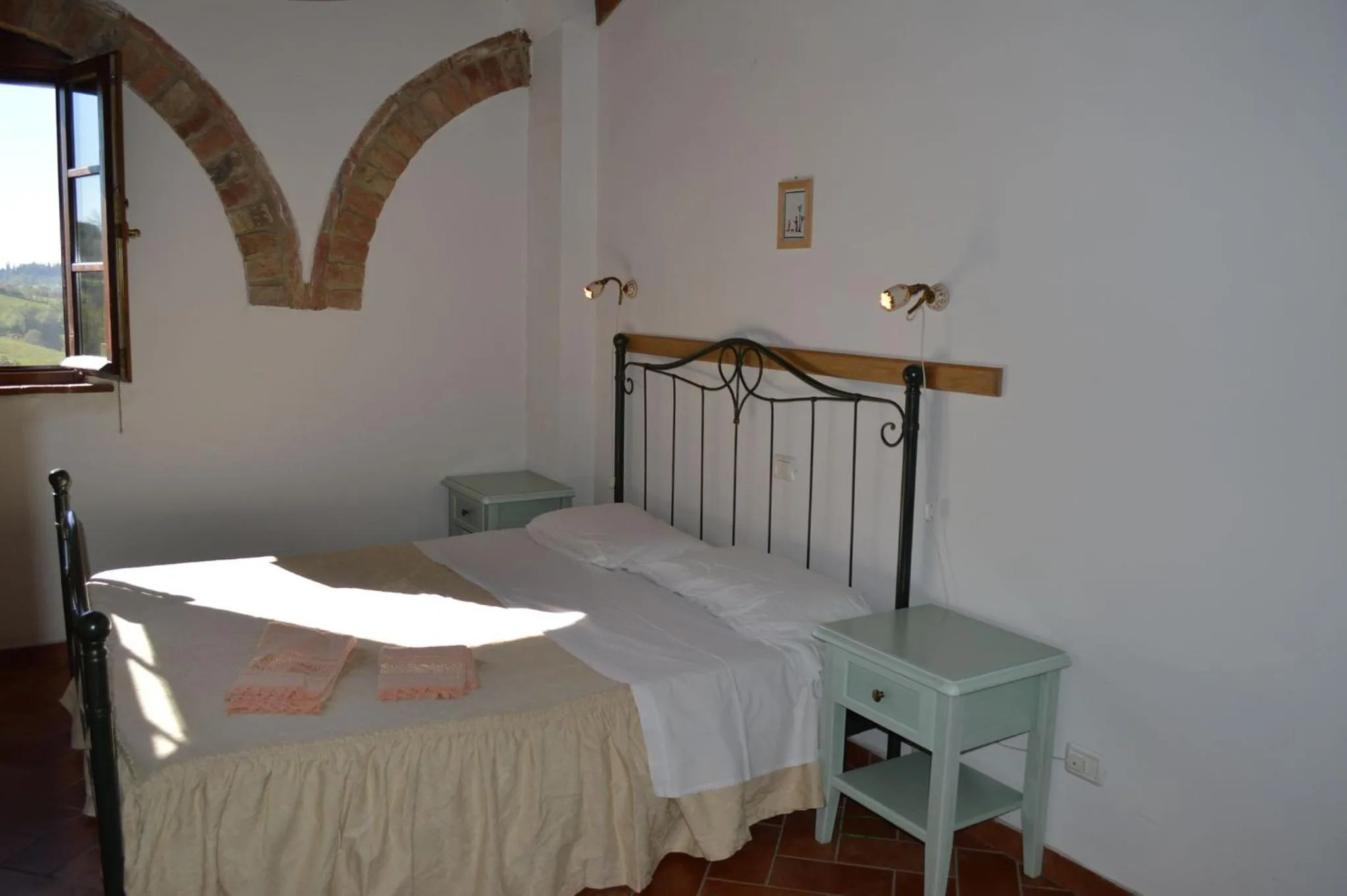 Bedroom in Holidays in apartment with swimming pool in Tuscany Siena