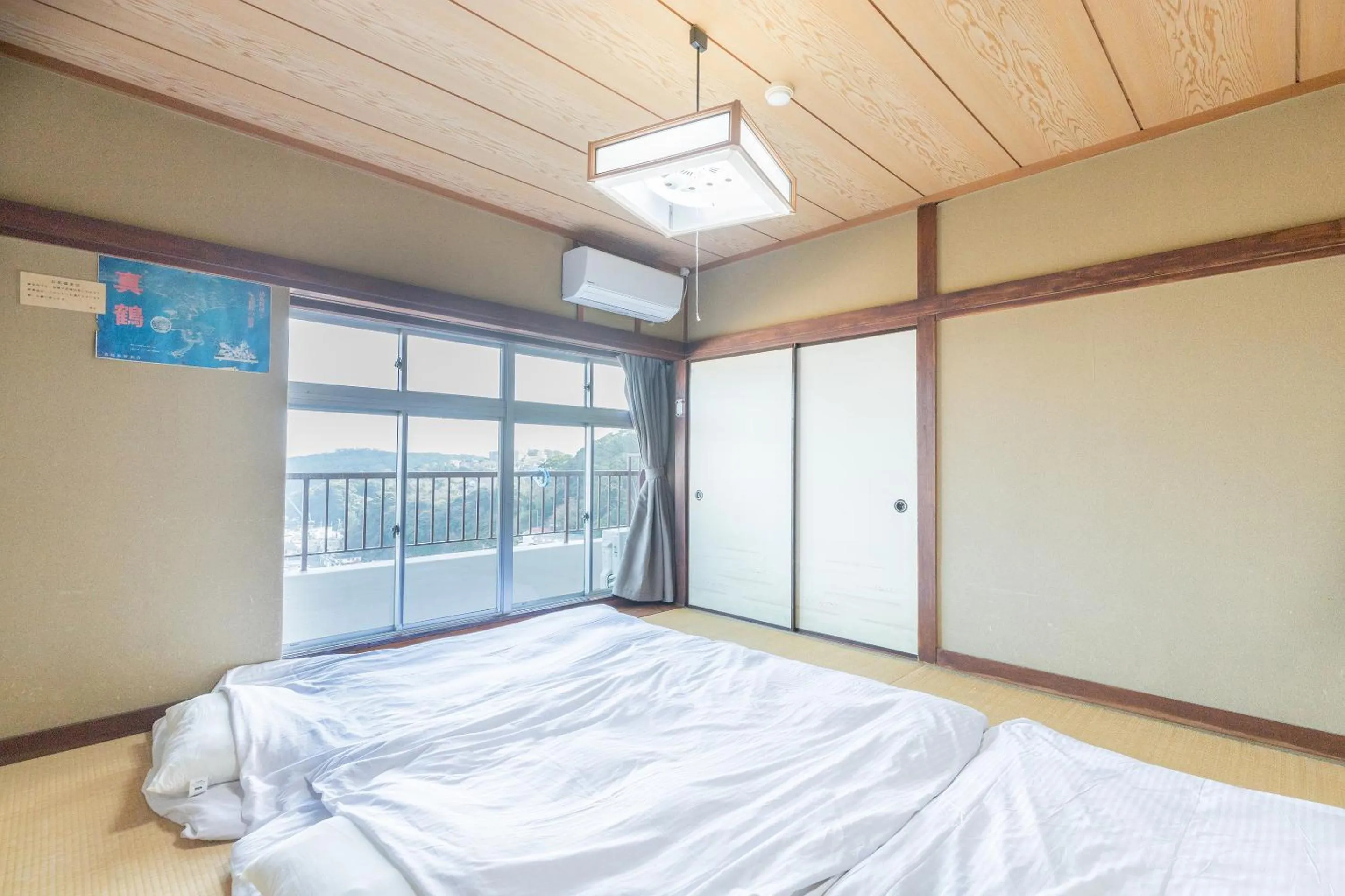 Bedroom, Bed in Tabist Miyoshi Ryokan Odawara Manazuru