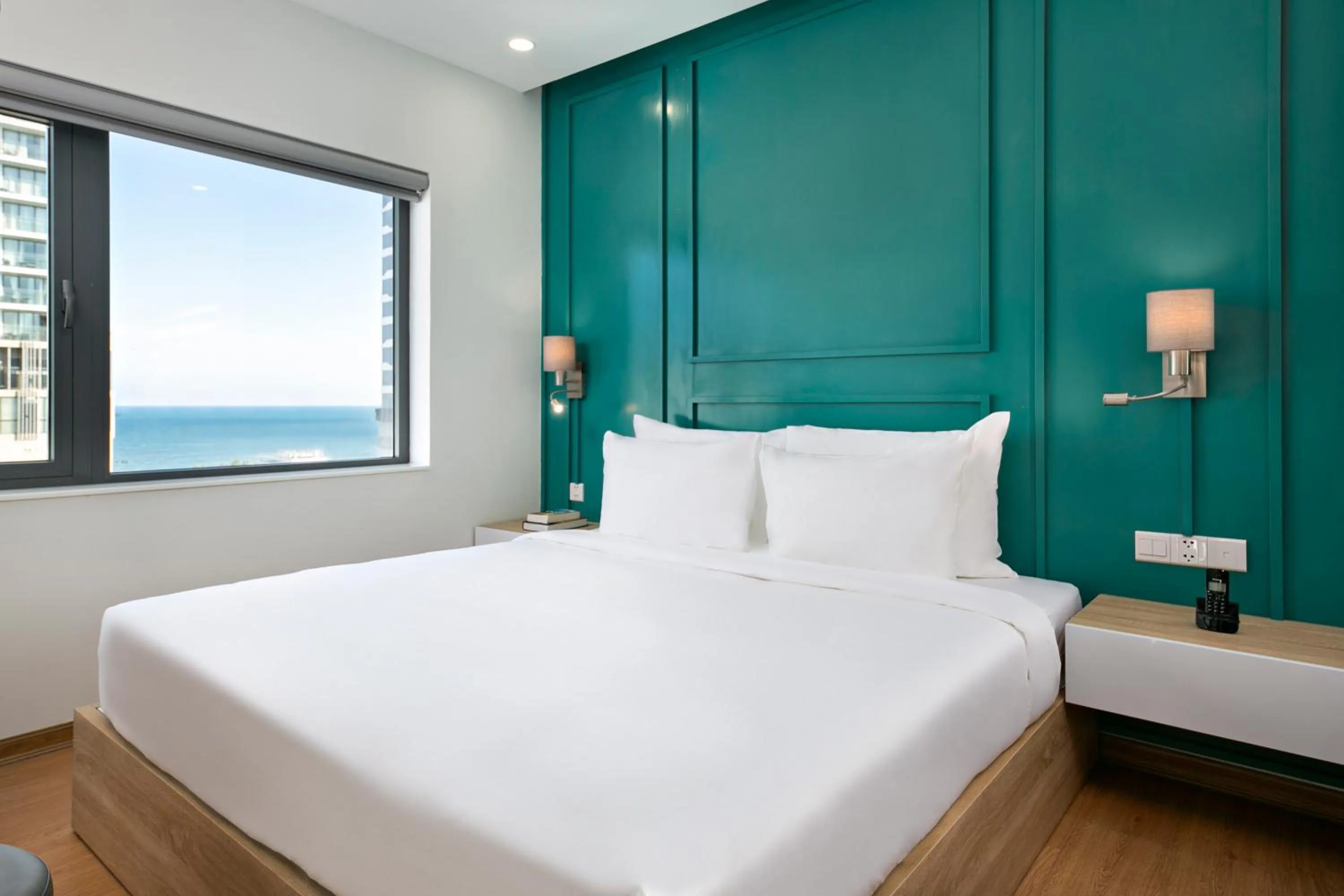 Bed in Dolphin Hotel and Apartment