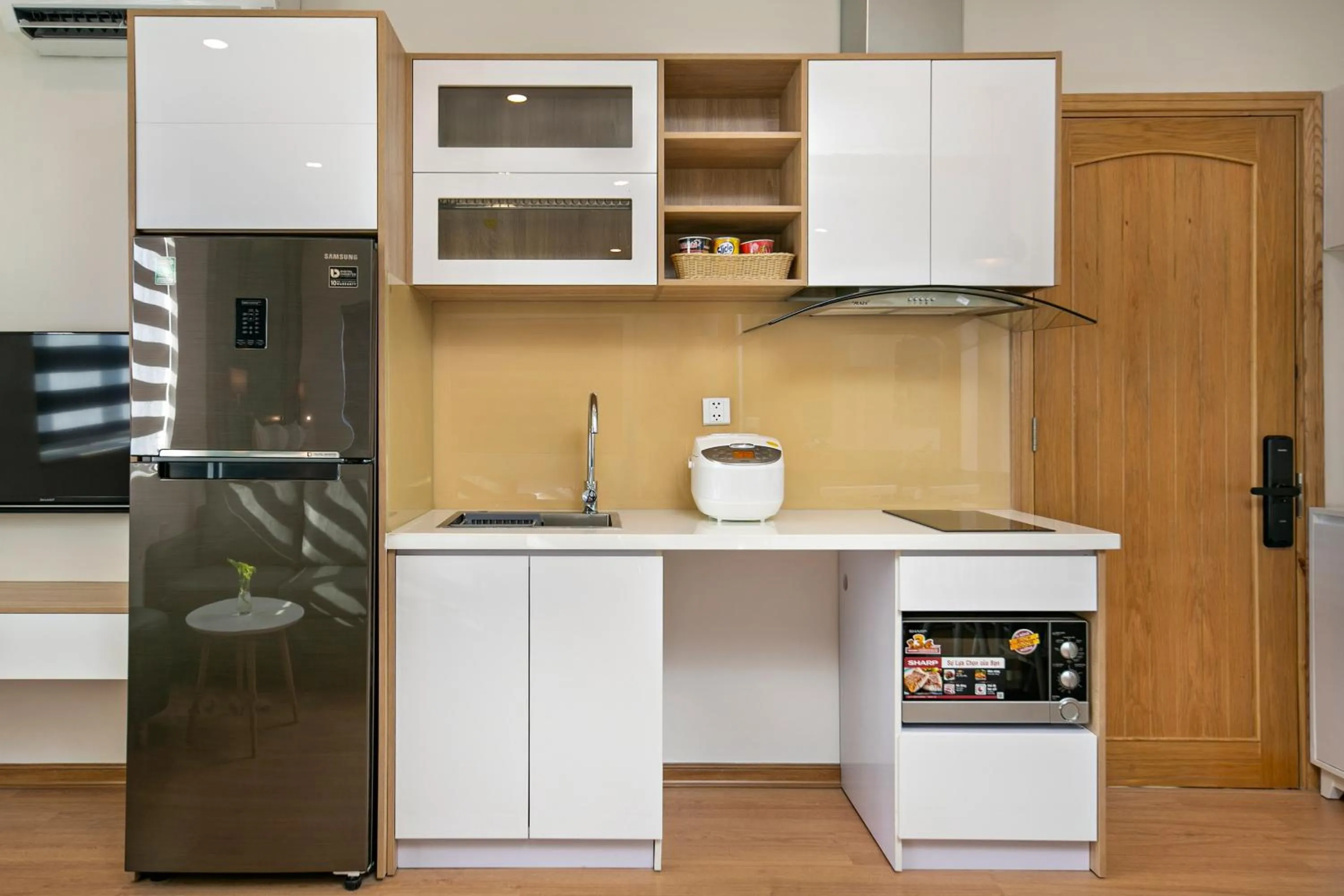 Kitchen or kitchenette in Dolphin Hotel and Apartment