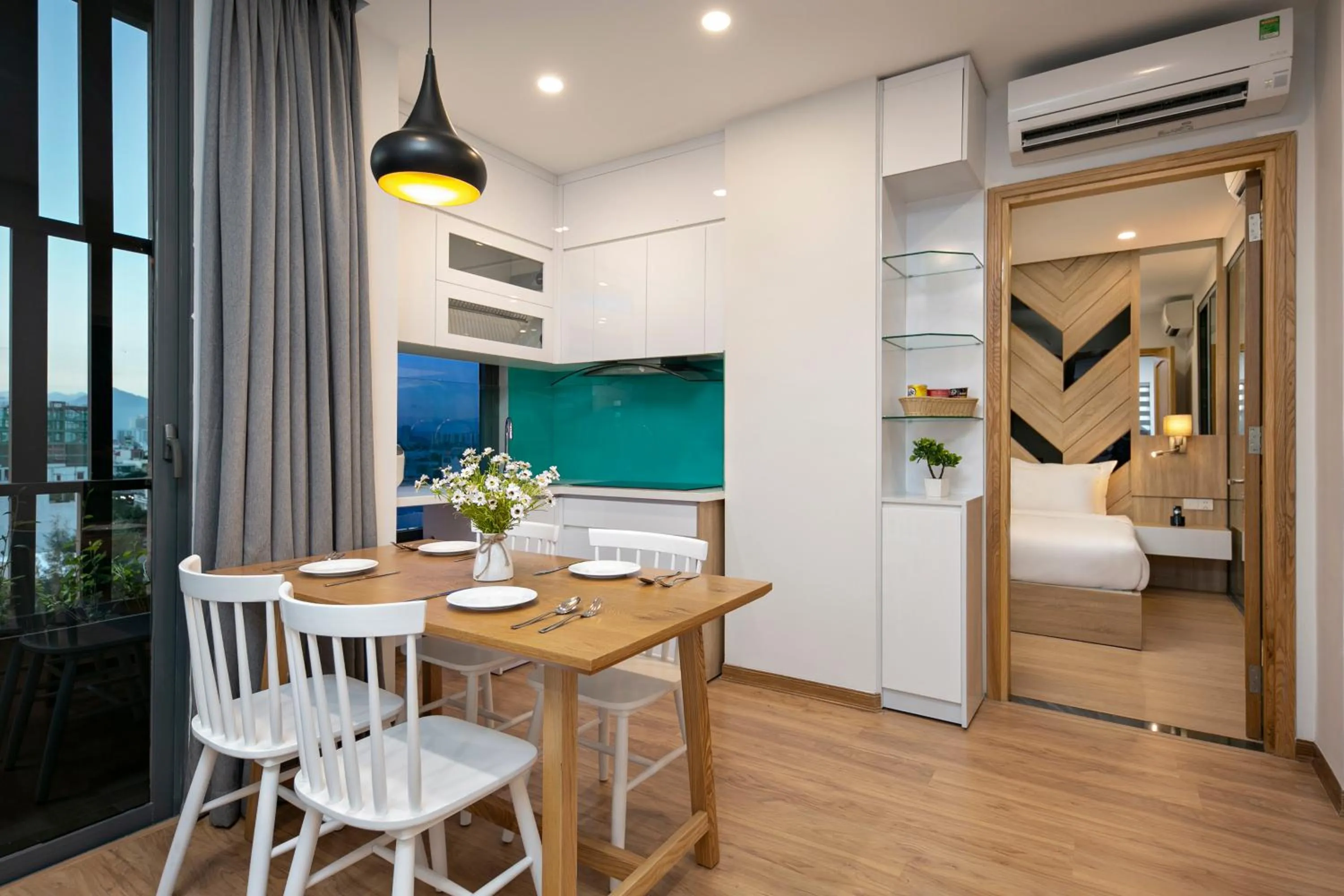 Dining area, Bed in Dolphin Hotel and Apartment