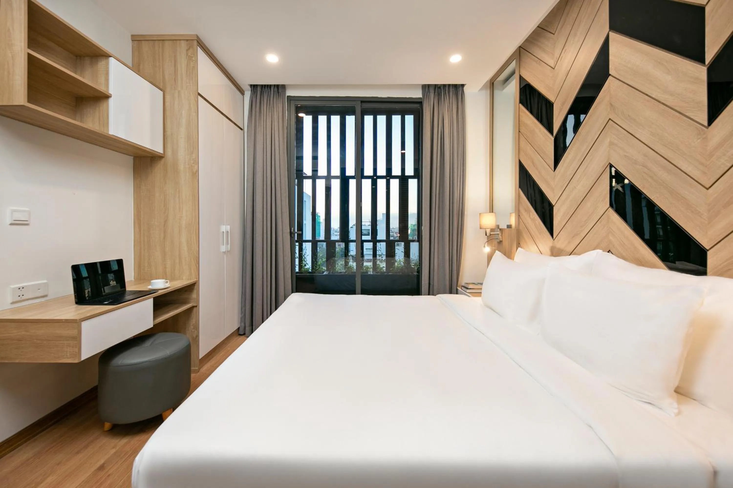 Bed in Dolphin Hotel and Apartment