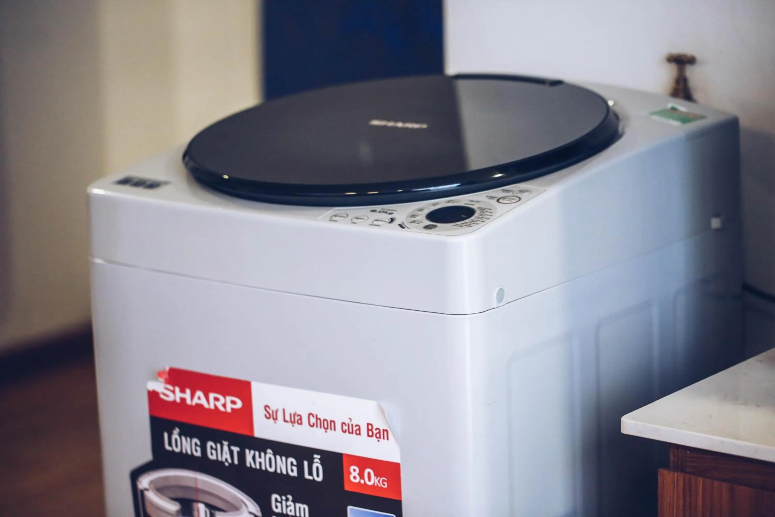 washing machine in TTR Studio Apart Hotel