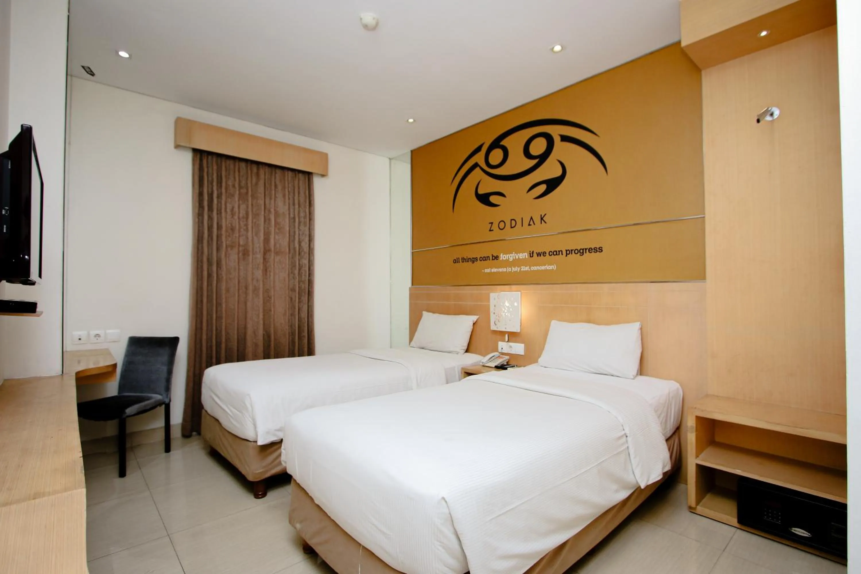 Bed in Zodiak Asia Afrika by KAGUM Hotels