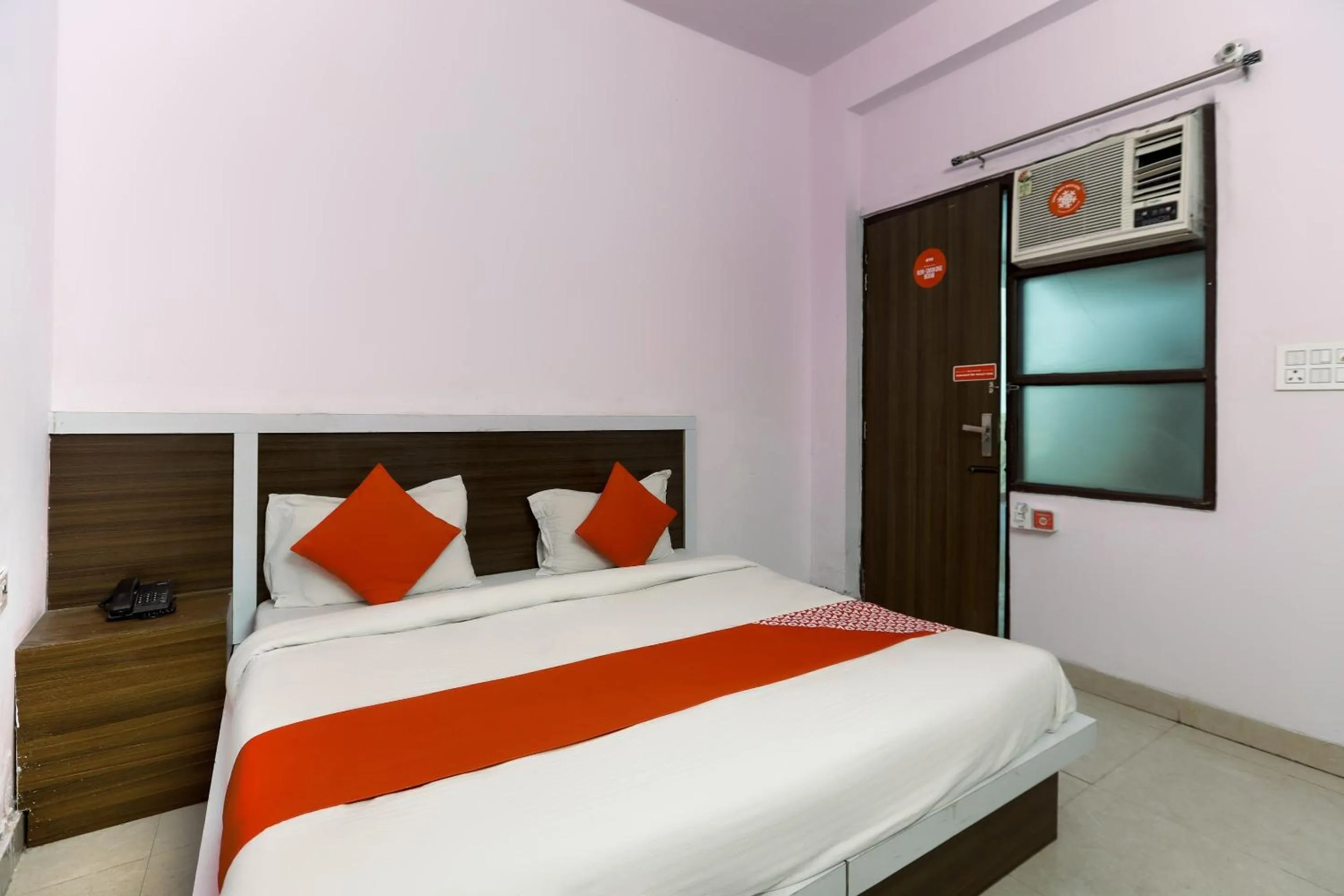 Bedroom, Bed in Hotel O Noida Villa