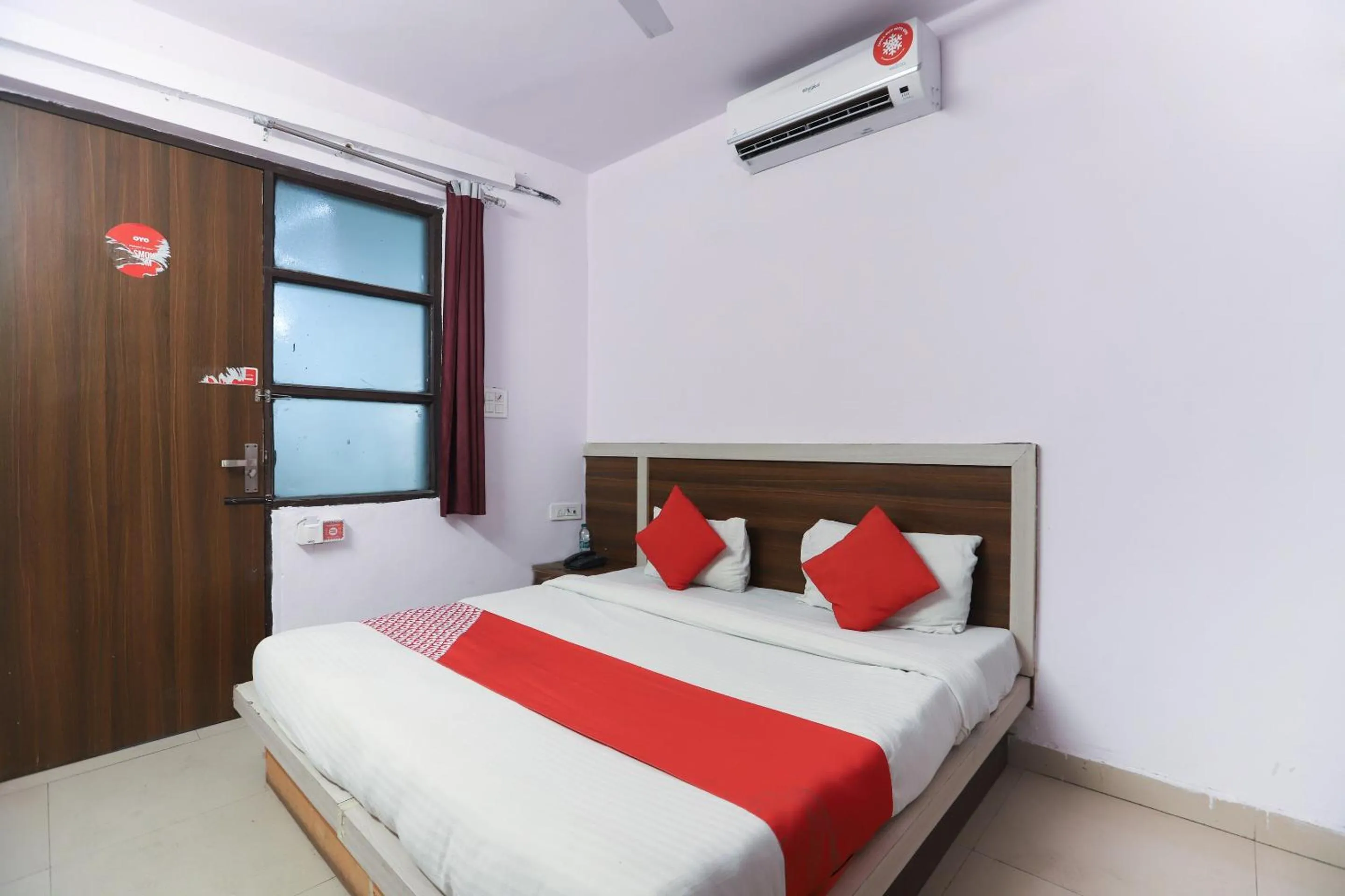 Bedroom, Bed in Hotel O Noida Villa