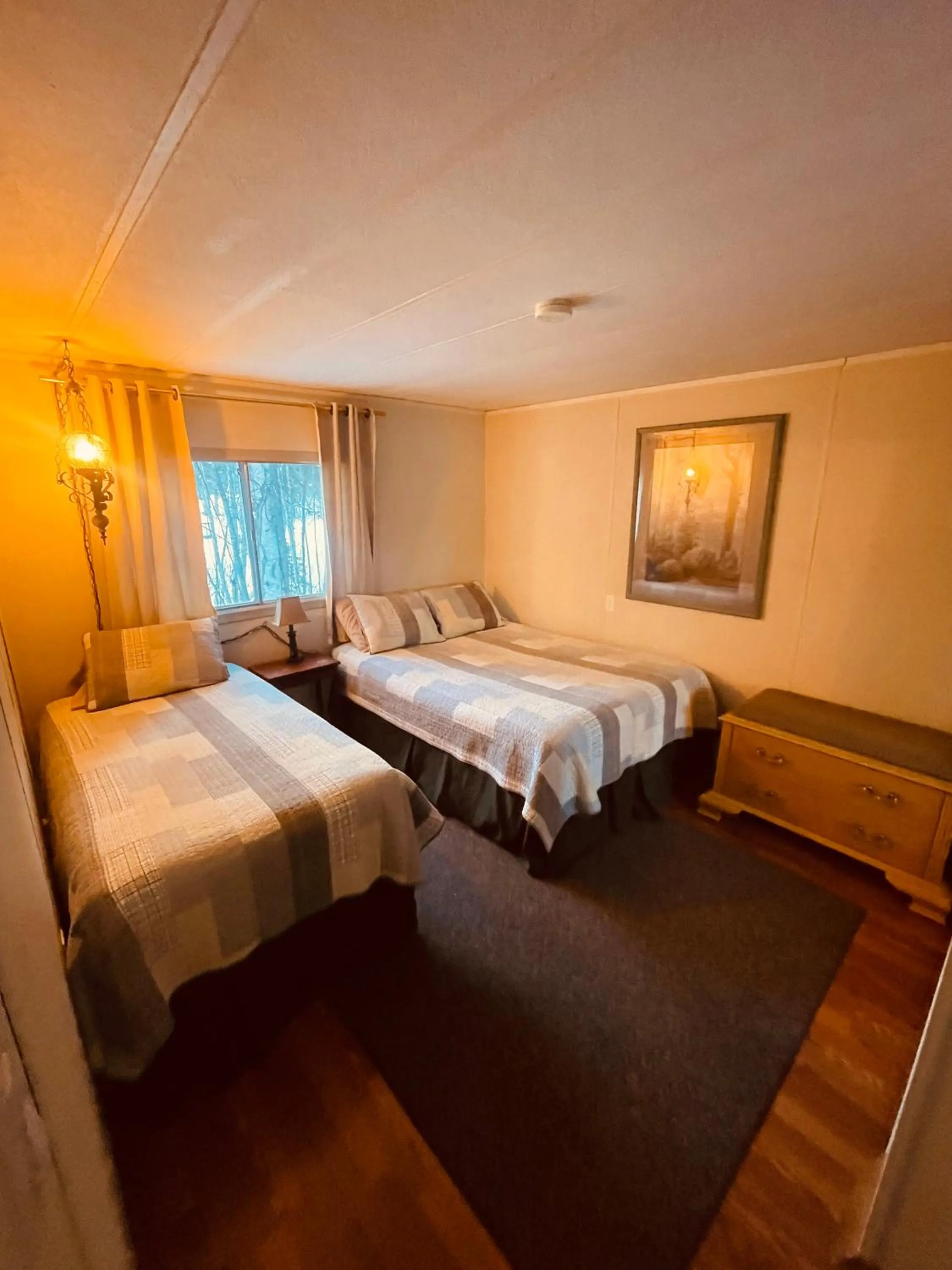 Bed in Summit River Lodge & Campsites