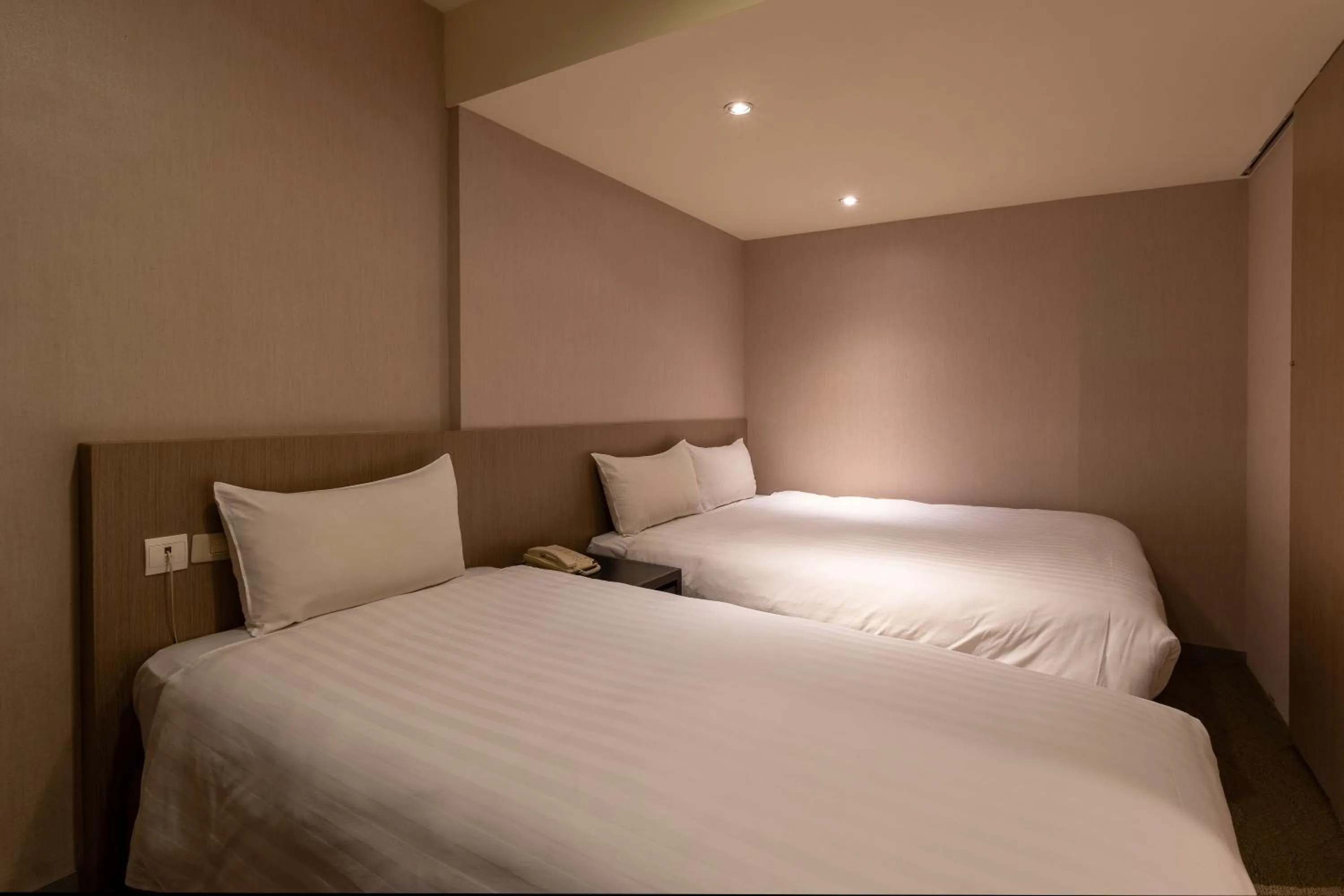 Bed in Guide Hotel Taipei Chongqing