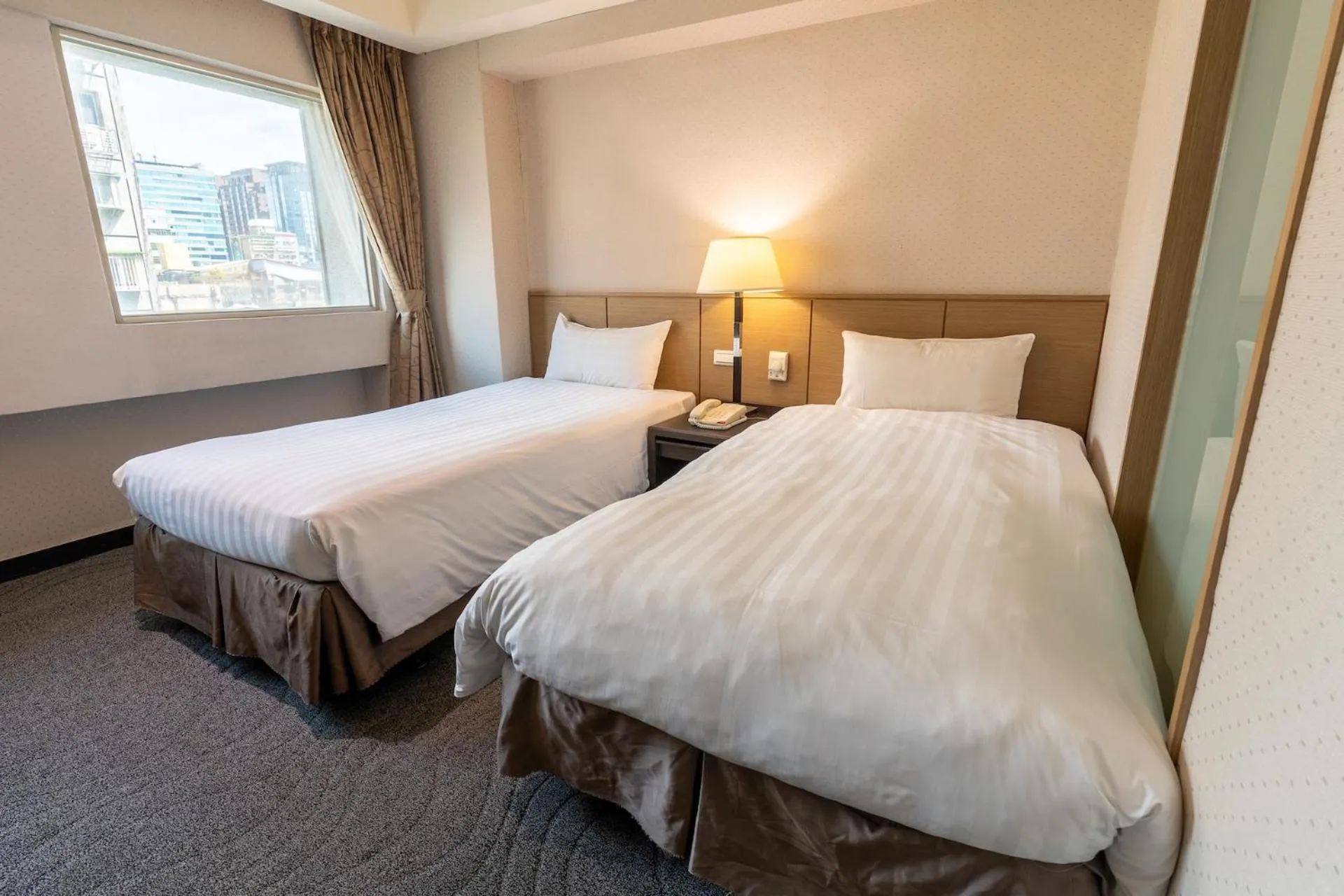 Bed in Guide Hotel Taipei Chongqing