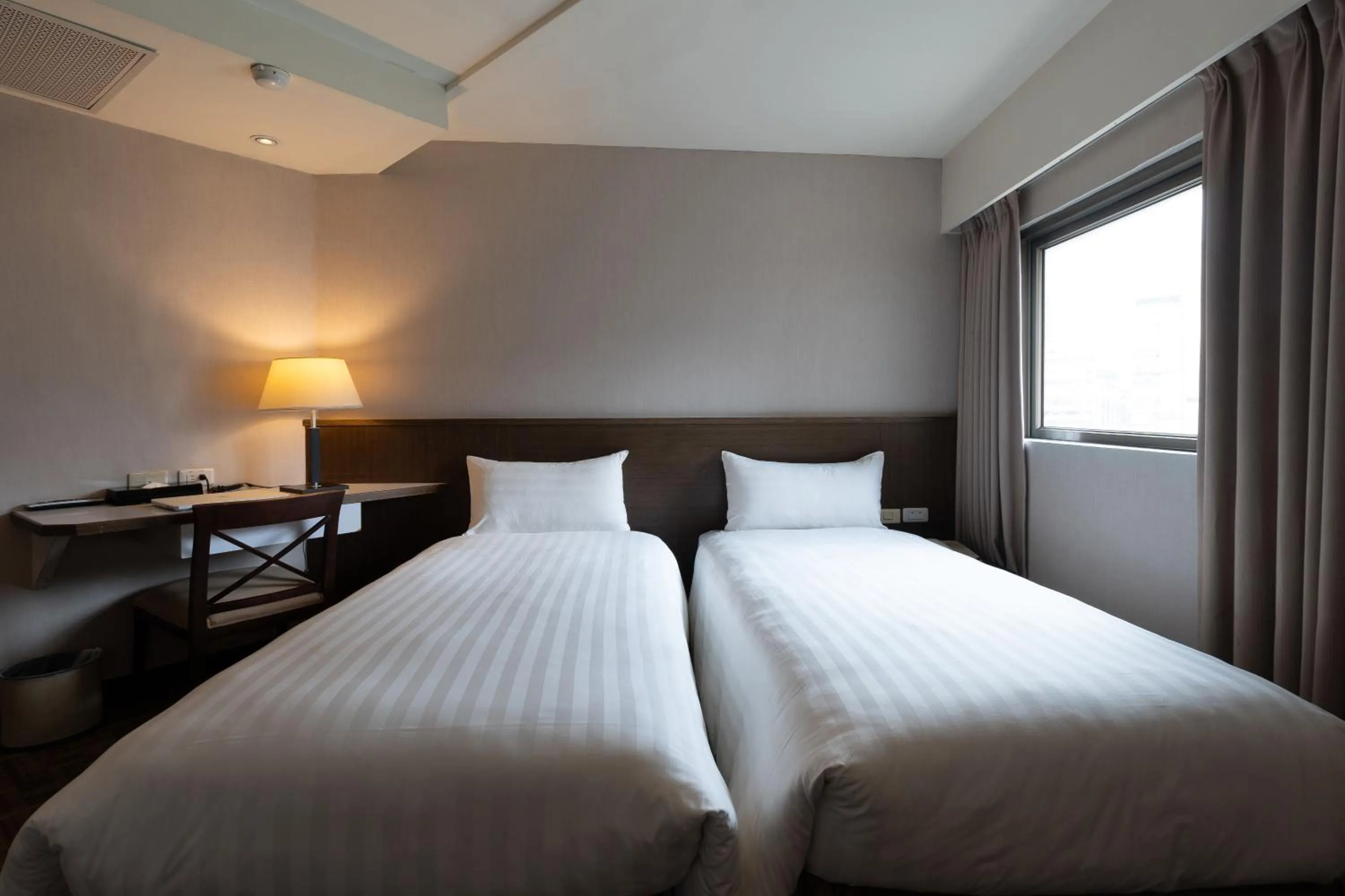 Bed in Guide Hotel Taipei Chongqing