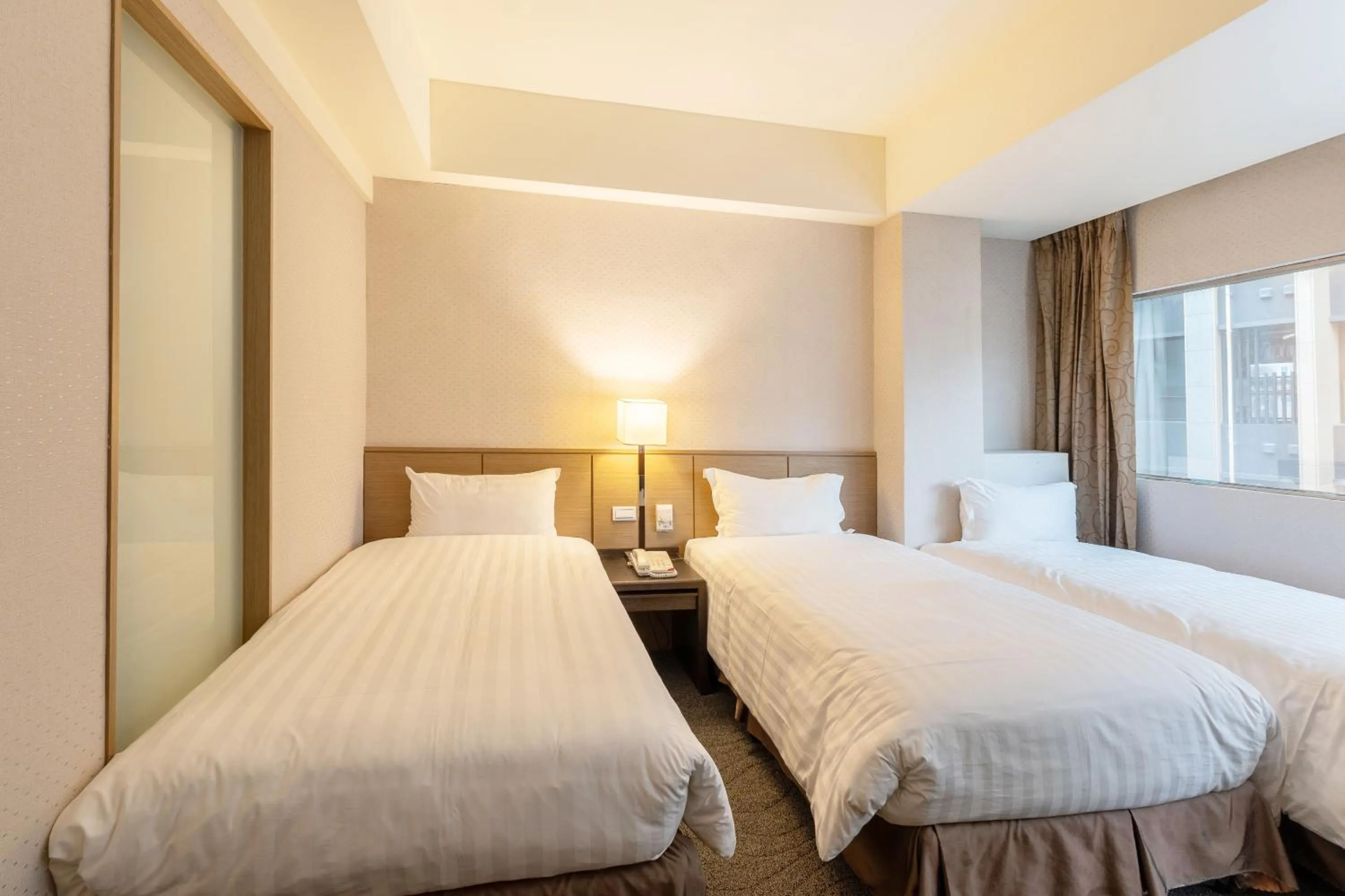 Bed in Guide Hotel Taipei Chongqing