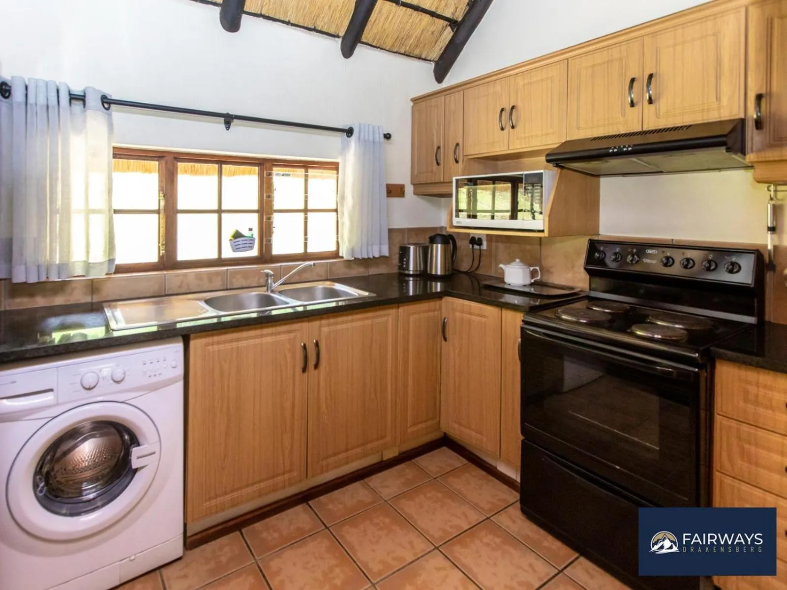Kitchen or kitchenette in Fairways Drakensberg Resort
