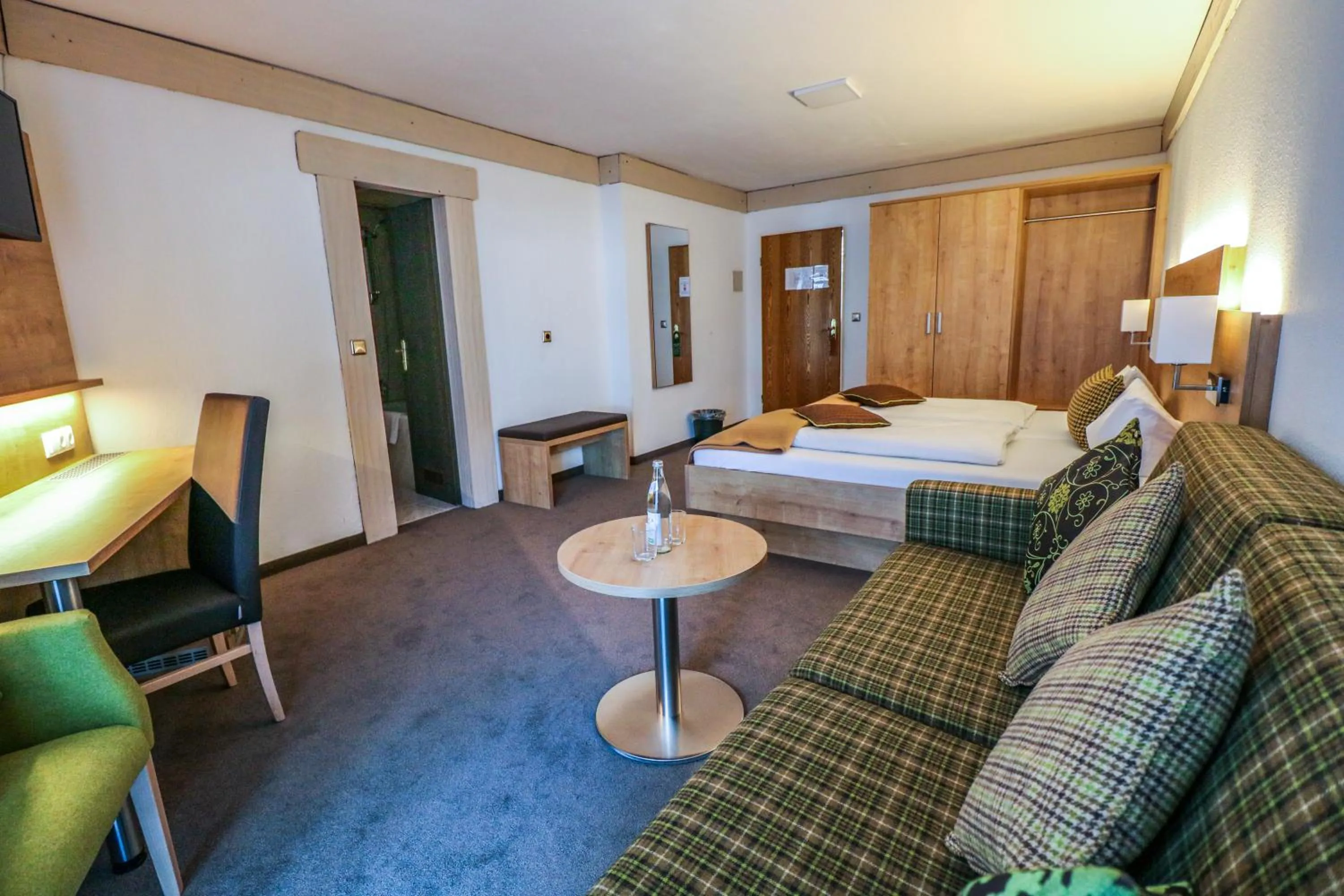 Photo of the whole room, Bed in Hotel Quellenhof