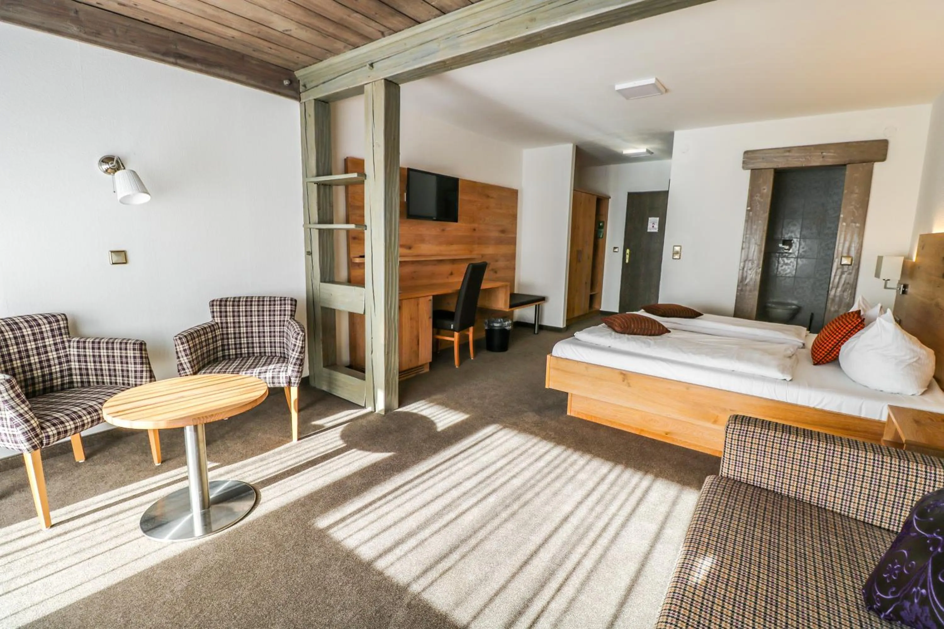 Photo of the whole room, Bed in Hotel Quellenhof