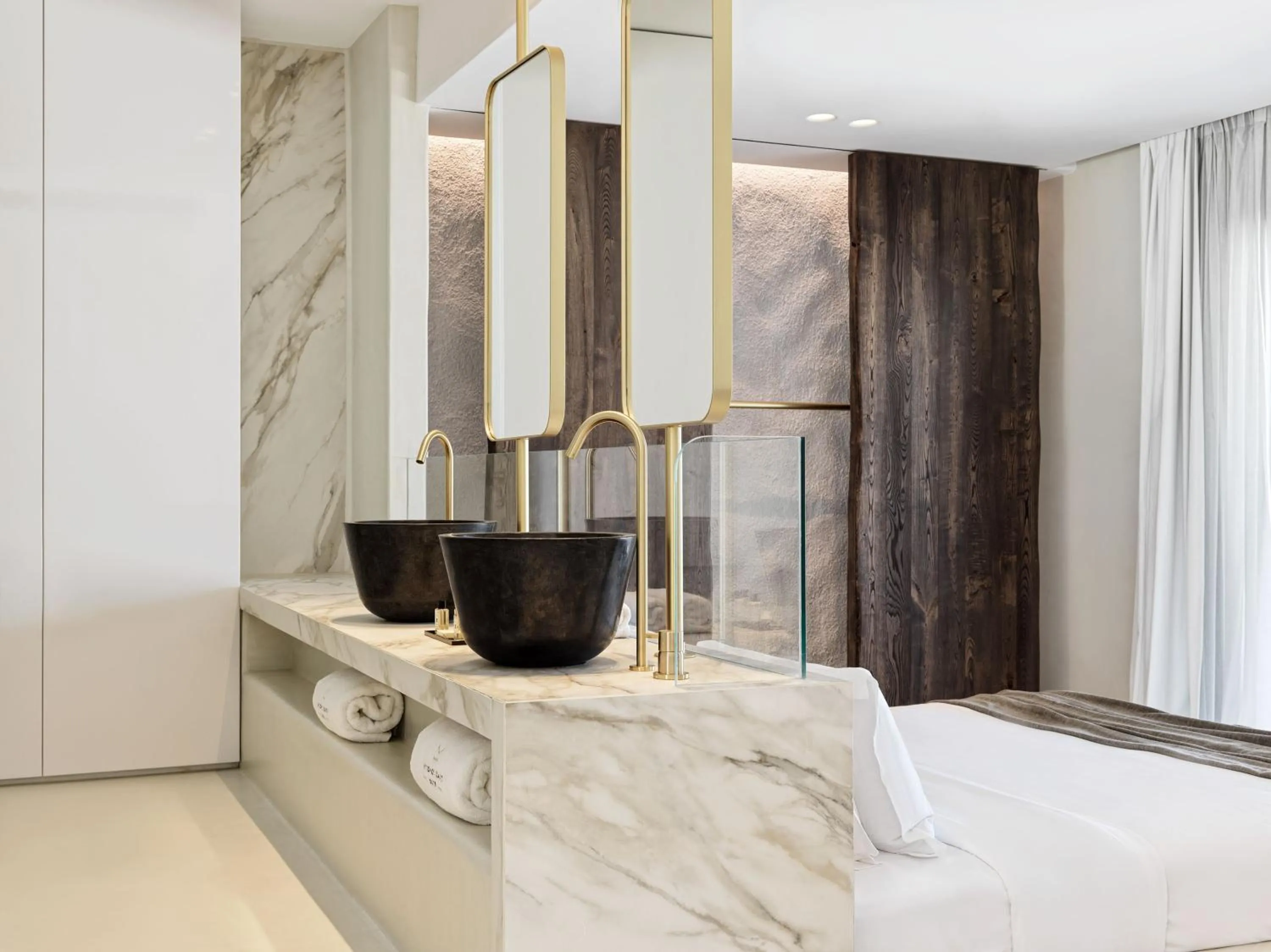 Bed in Mykonos Earth Suites