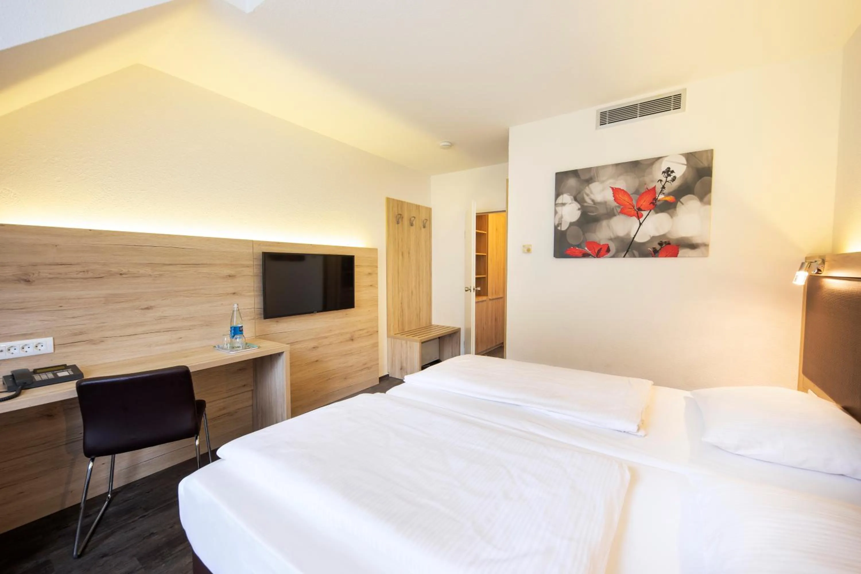 Photo of the whole room, Bed in ACHAT Hotel Monschau