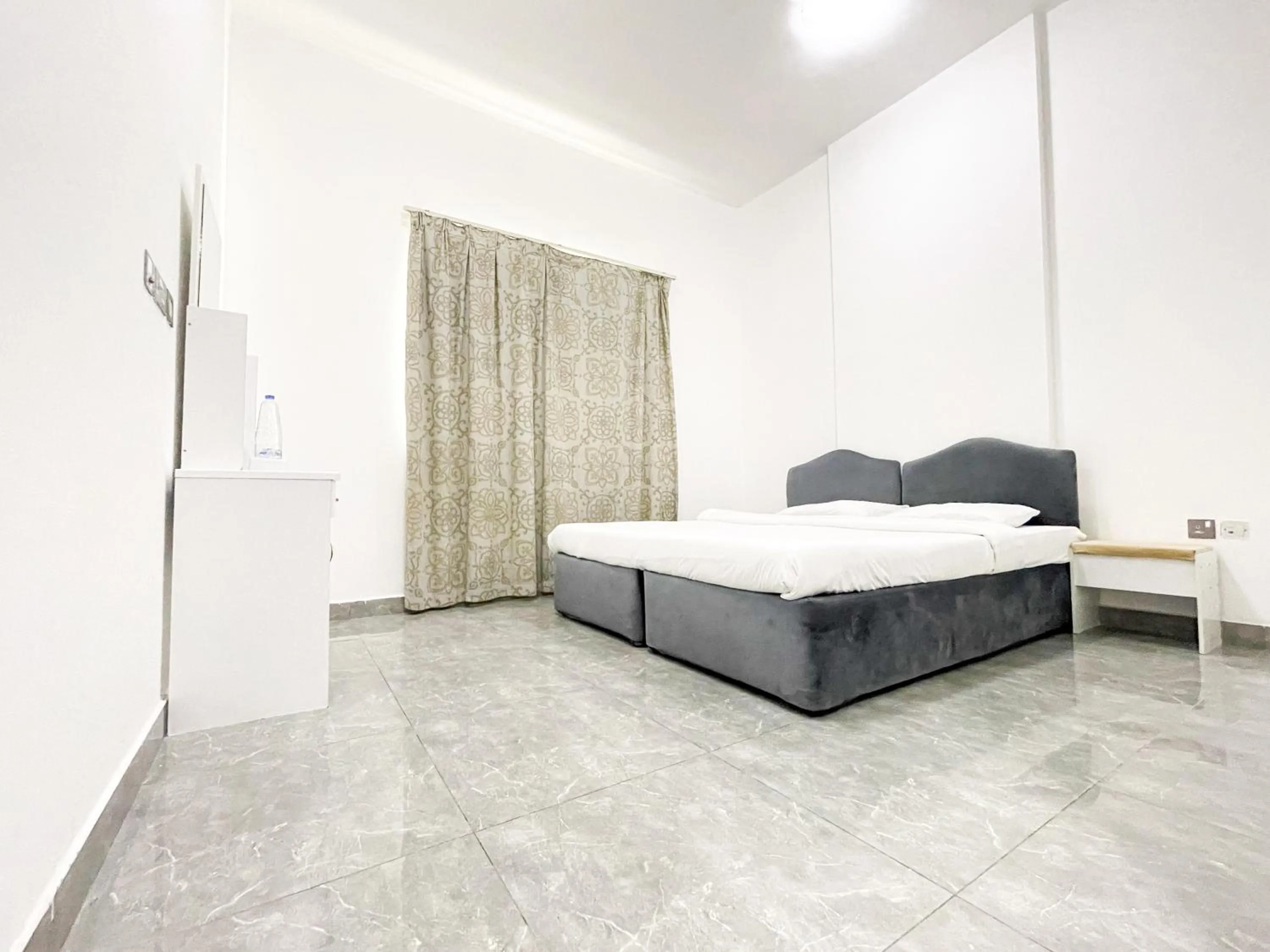 Bed in Warsan Star Residence - Home Stay