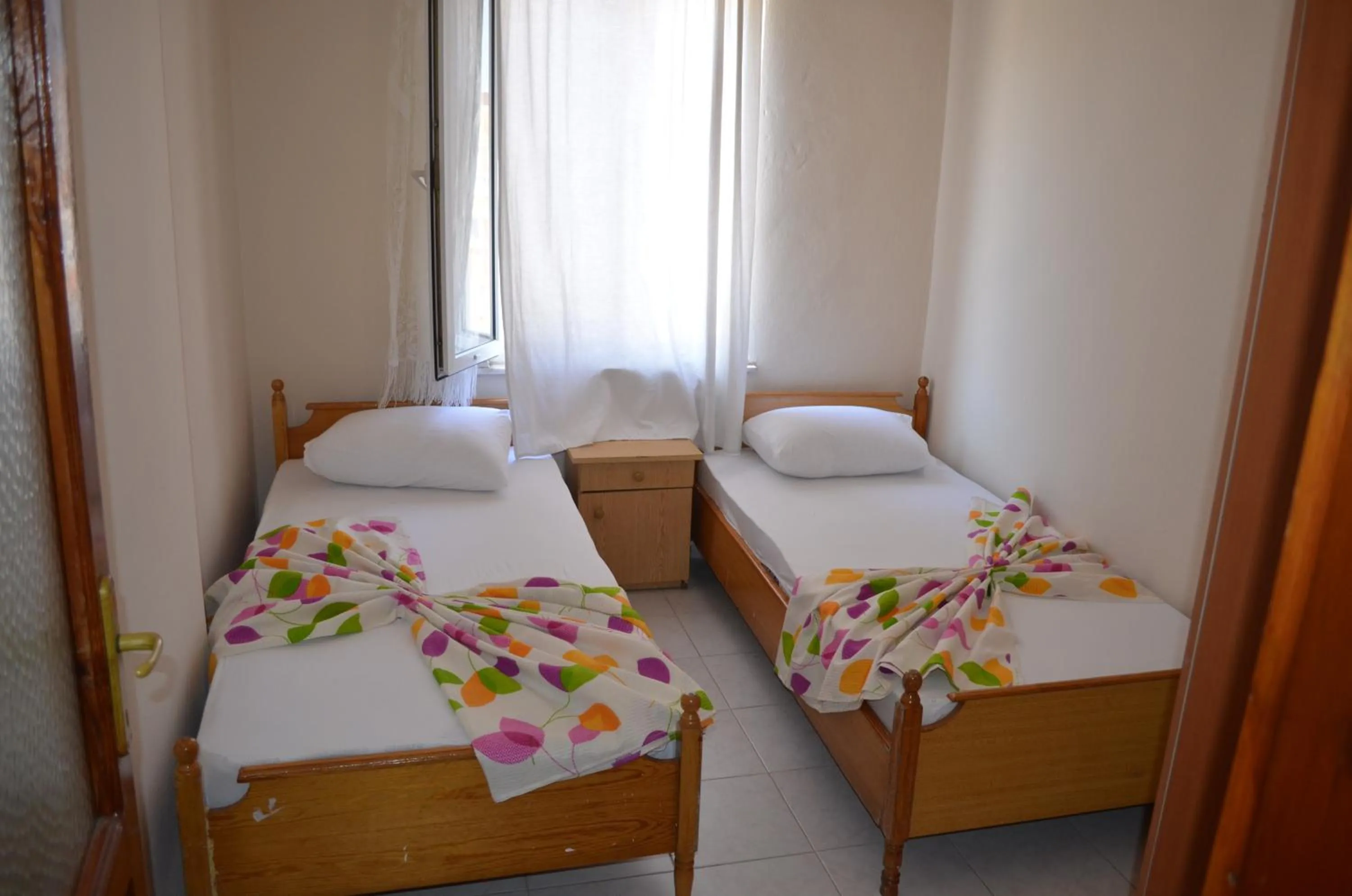Kitchen or kitchenette, Bed in Ahmeda Apart Hotel