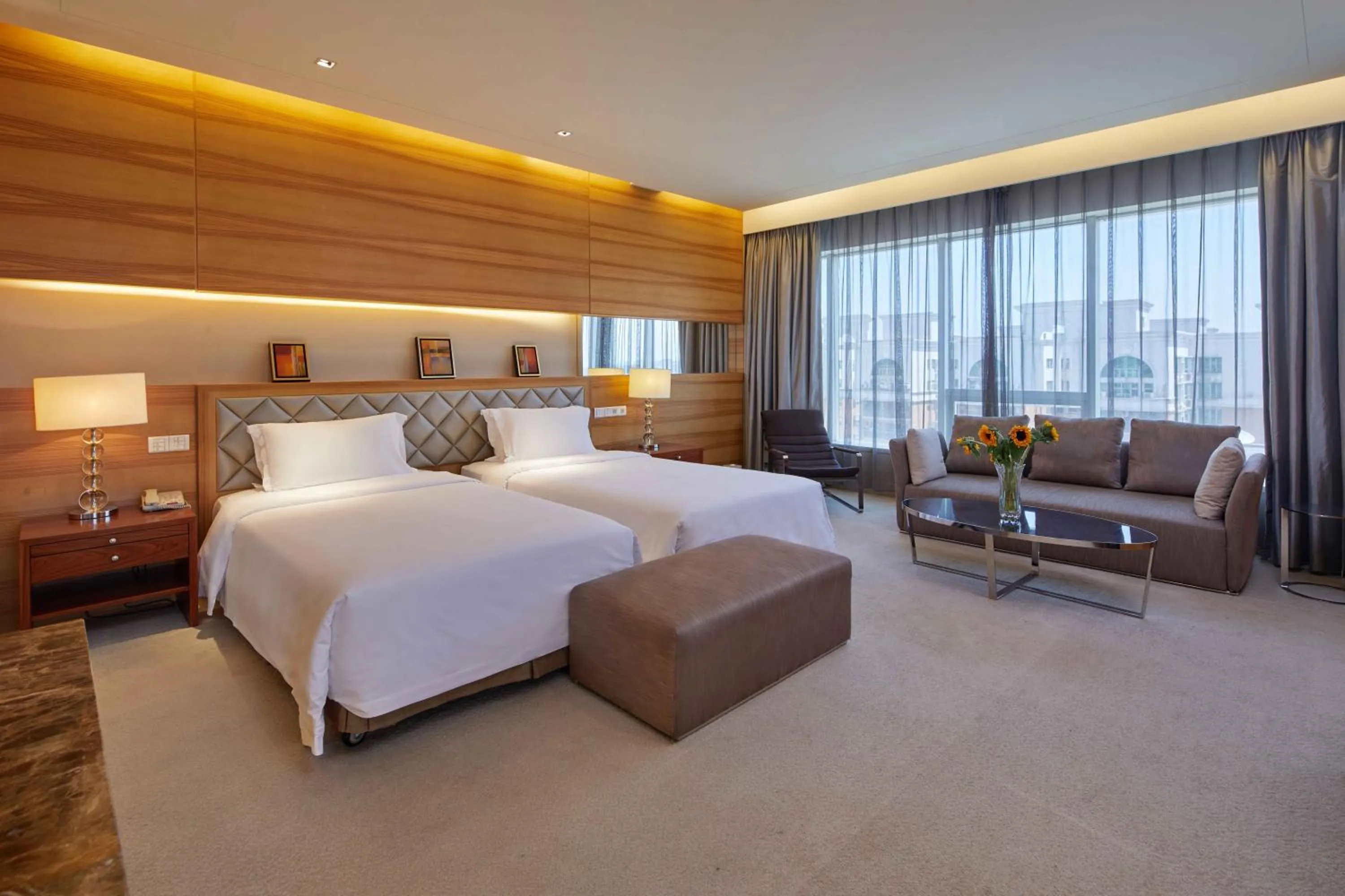 Photo of the whole room, Bed in HJ International Hotel