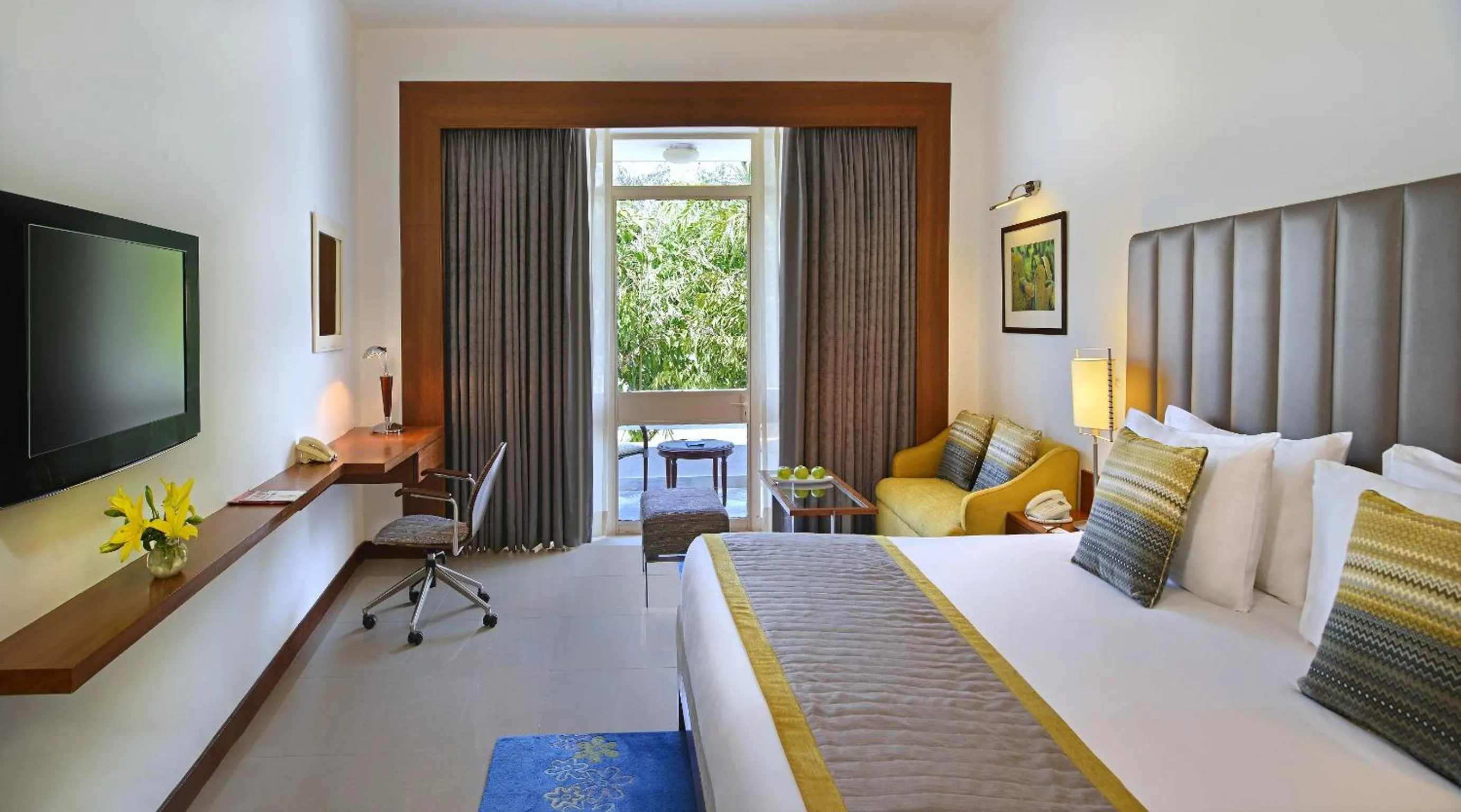 Photo of the whole room, Bed in Radisson Jass Hotel, Khajuraho