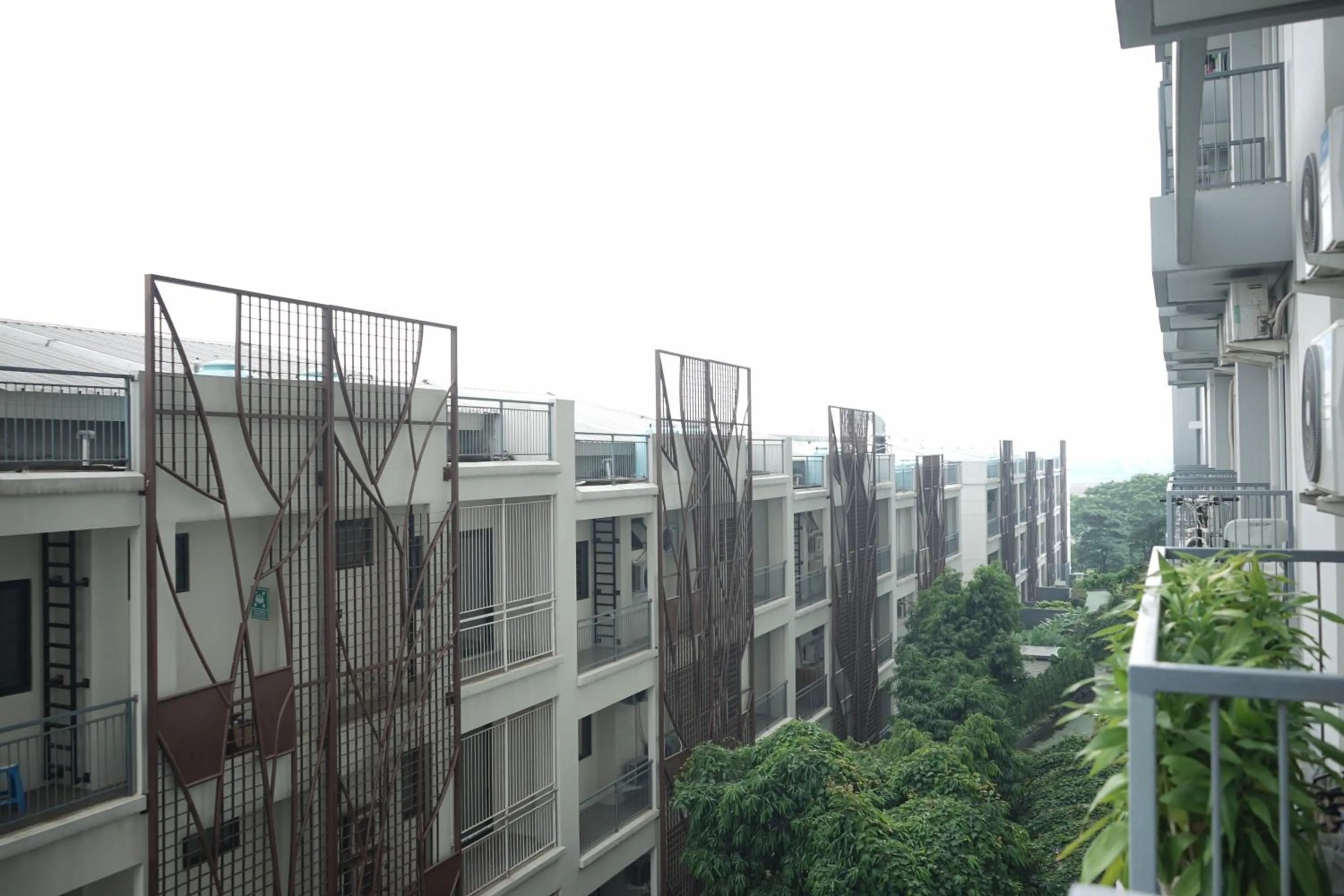 Cozy Minimalist Studio at Casa de Parco Apartment By Travelio