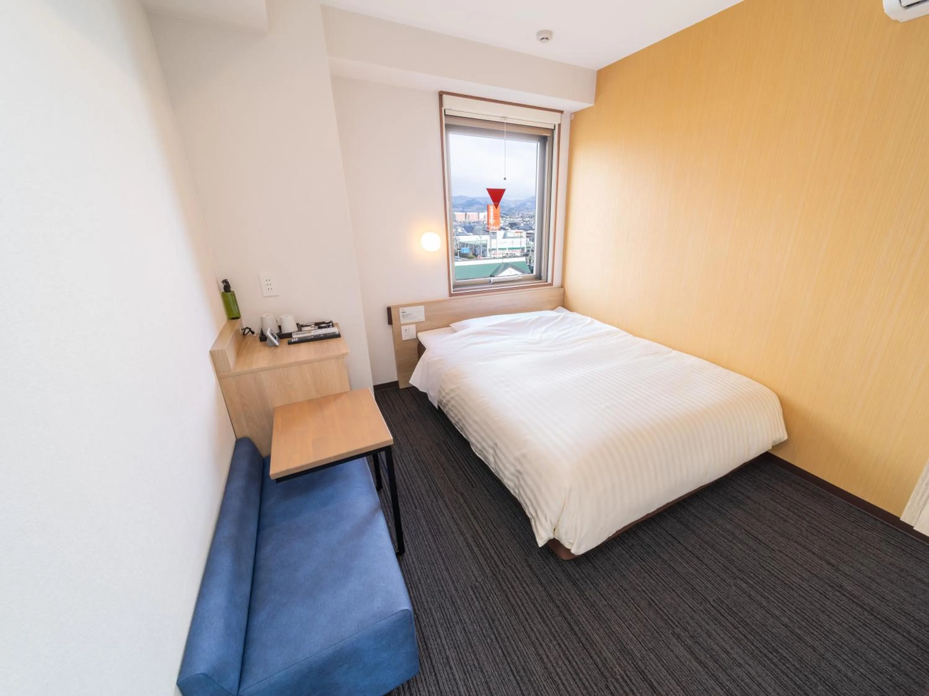 Bed in Super Hotel Yahaba Station East Exit