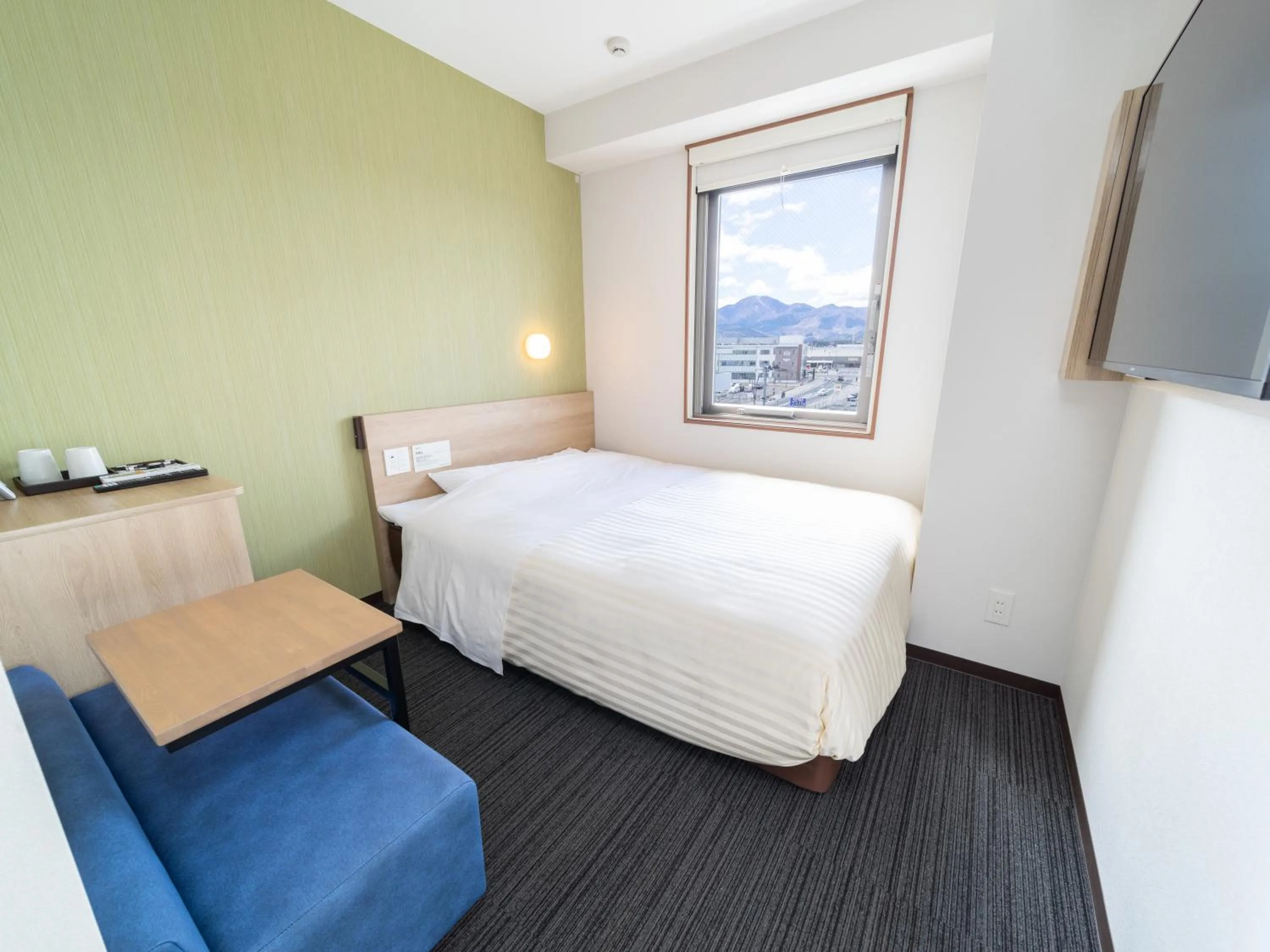 Bed in Super Hotel Yahaba Station East Exit