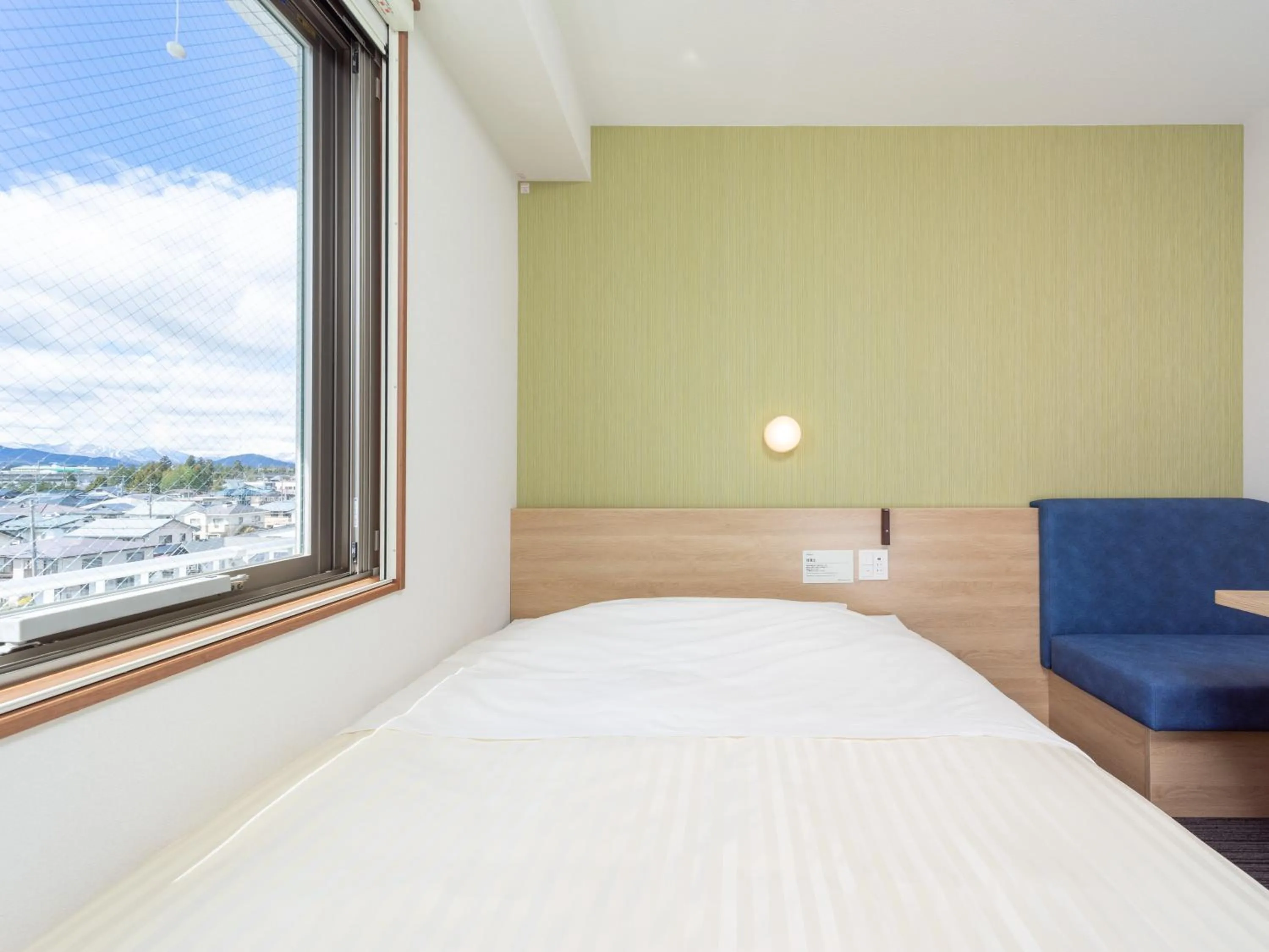 Bed in Super Hotel Yahaba Station East Exit