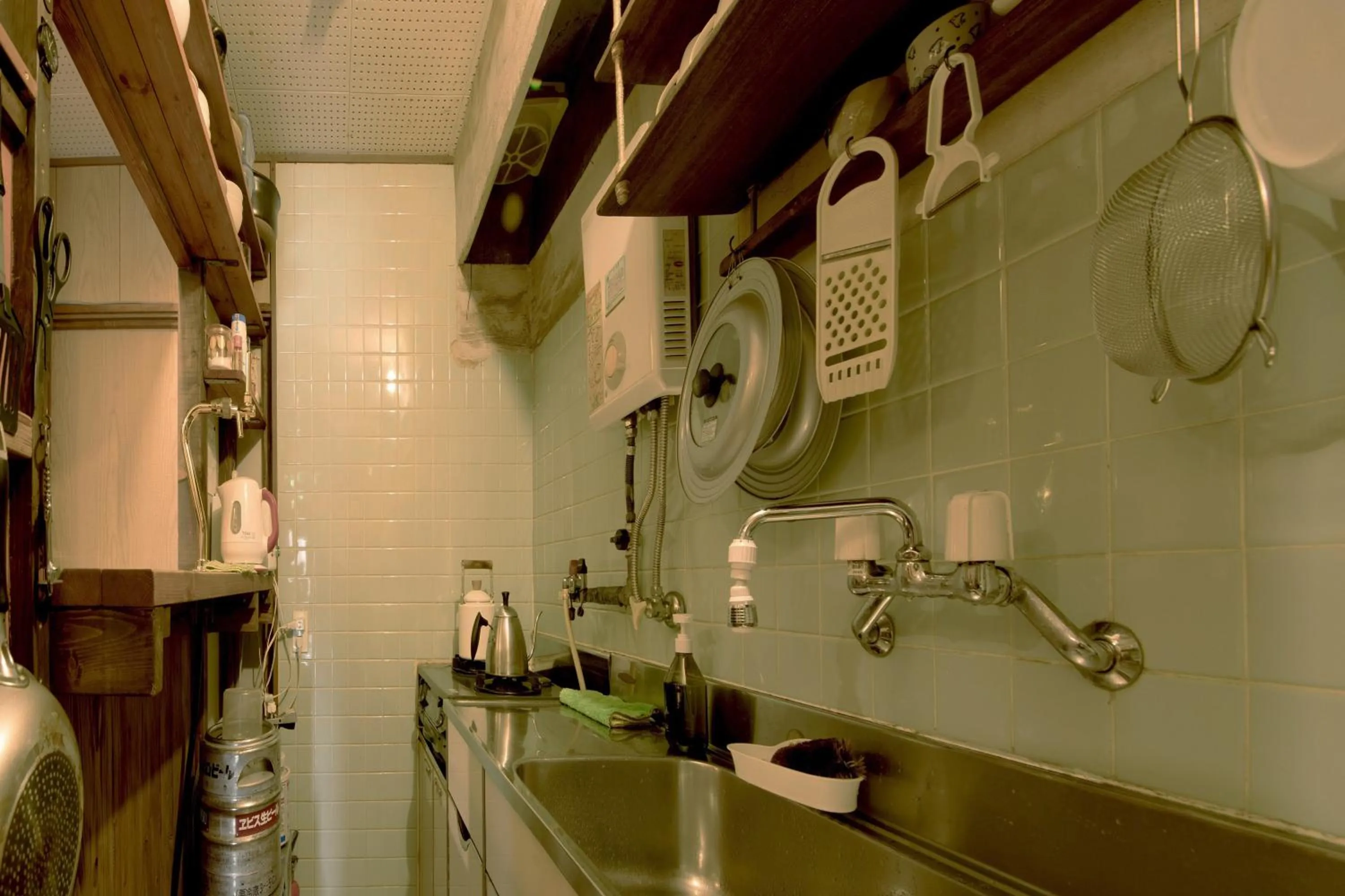 Kitchen or kitchenette in Guesthouse Yululu