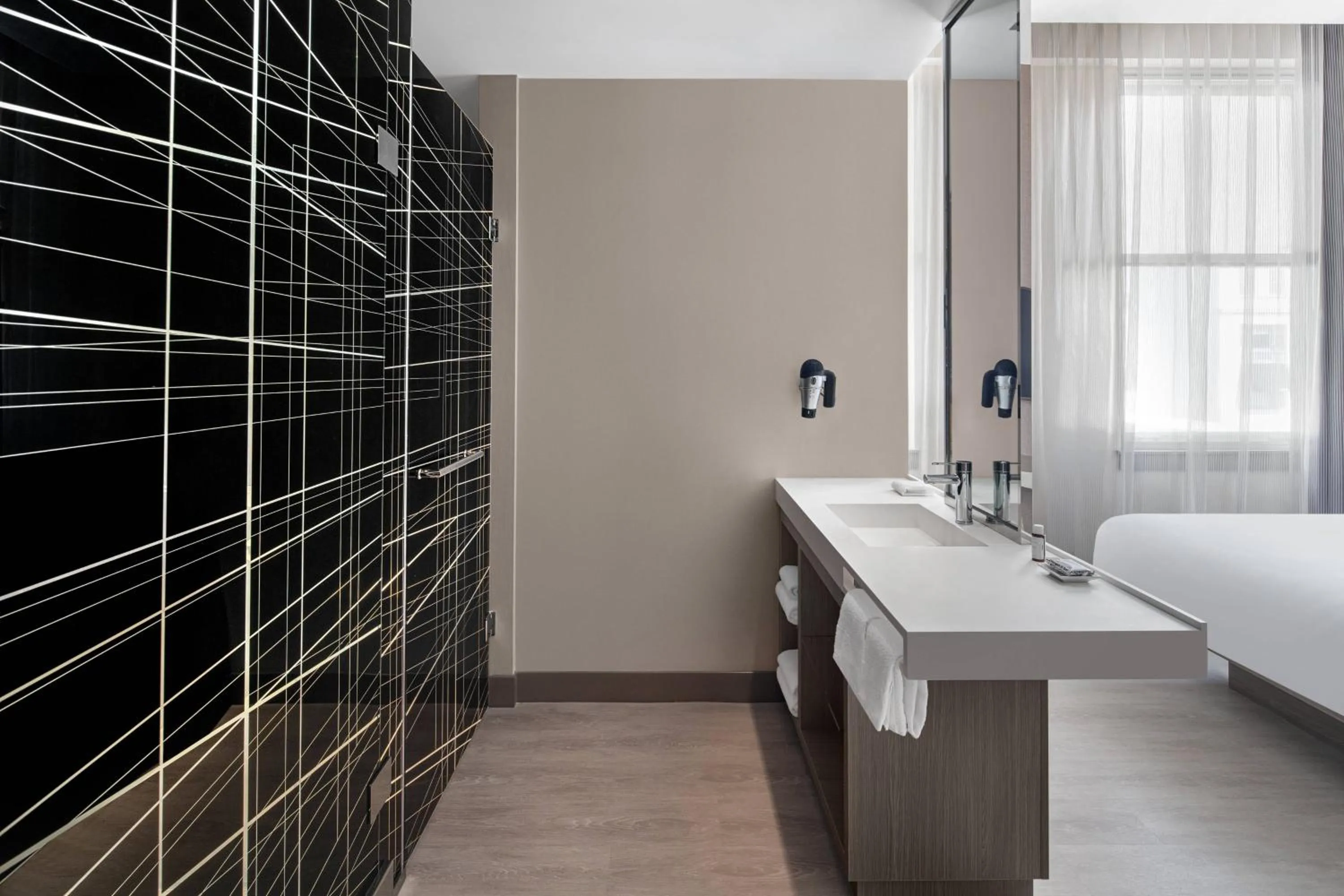 Bathroom, Bed in AC Hotel by Marriott Little Rock Downtown