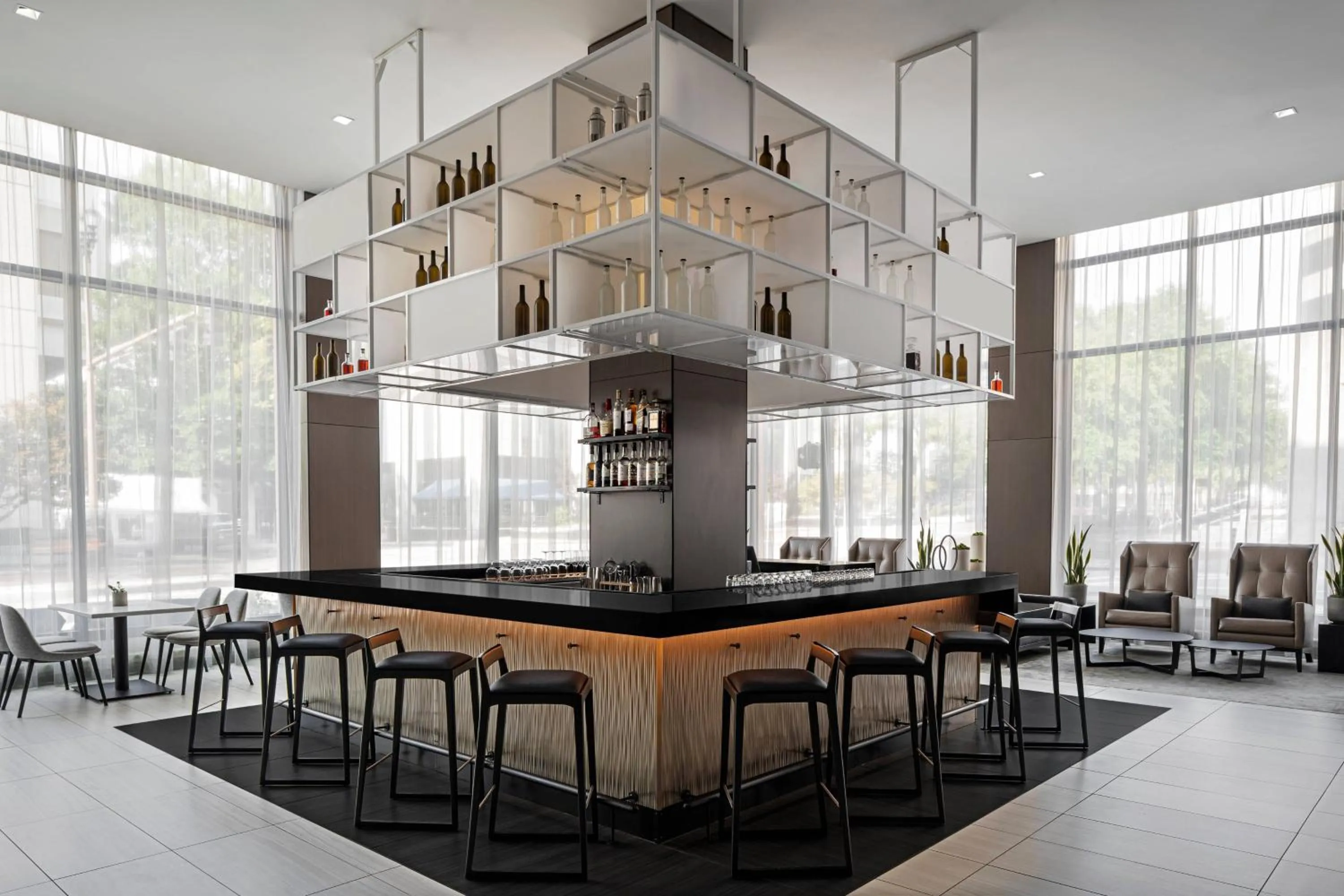 Lounge or bar in AC Hotel by Marriott Little Rock Downtown