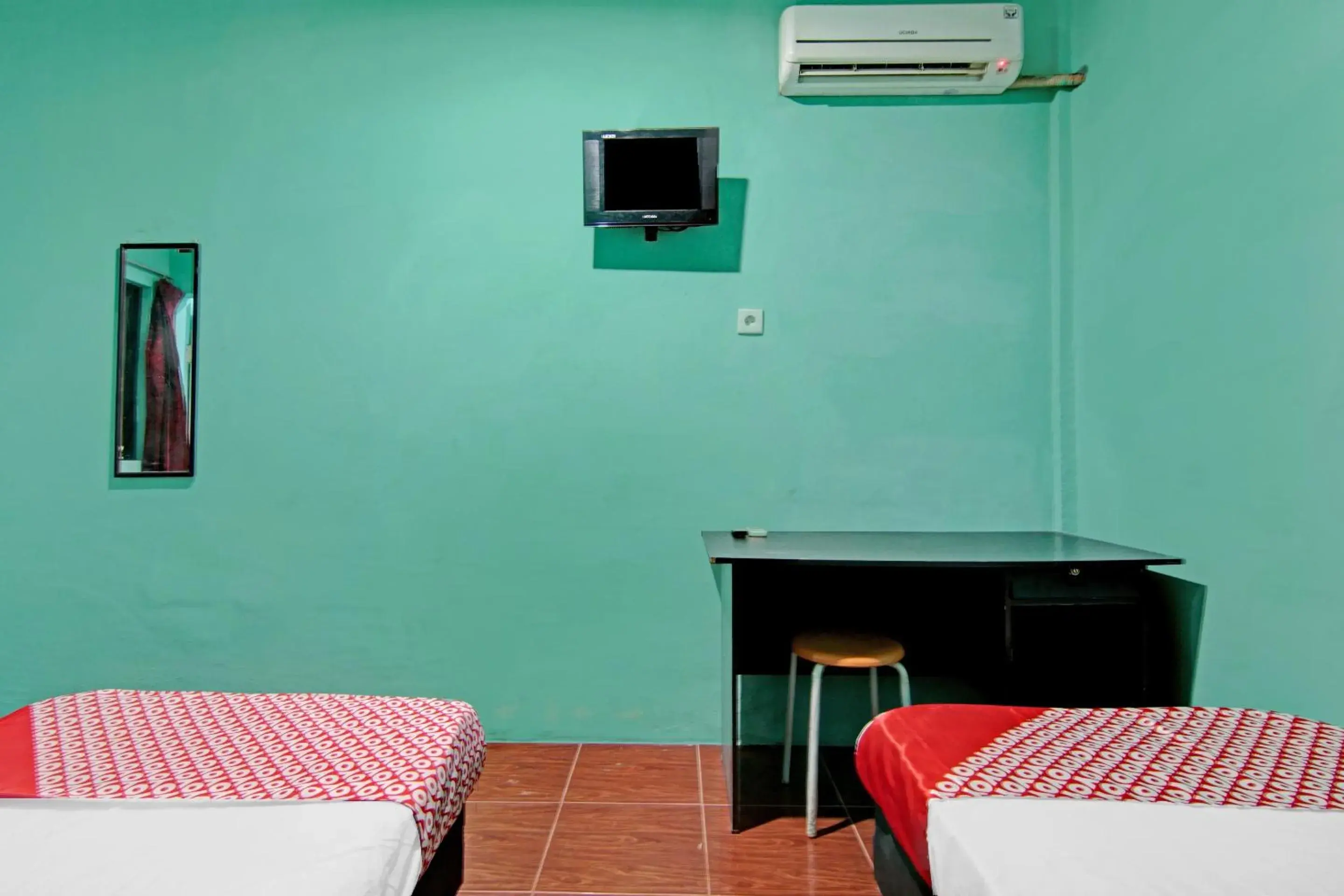 Standard Twin Room in OYO 3063 Homestay 22 Syariah Standard Twin Room in OYO 3063 Homestay 22 Syariah