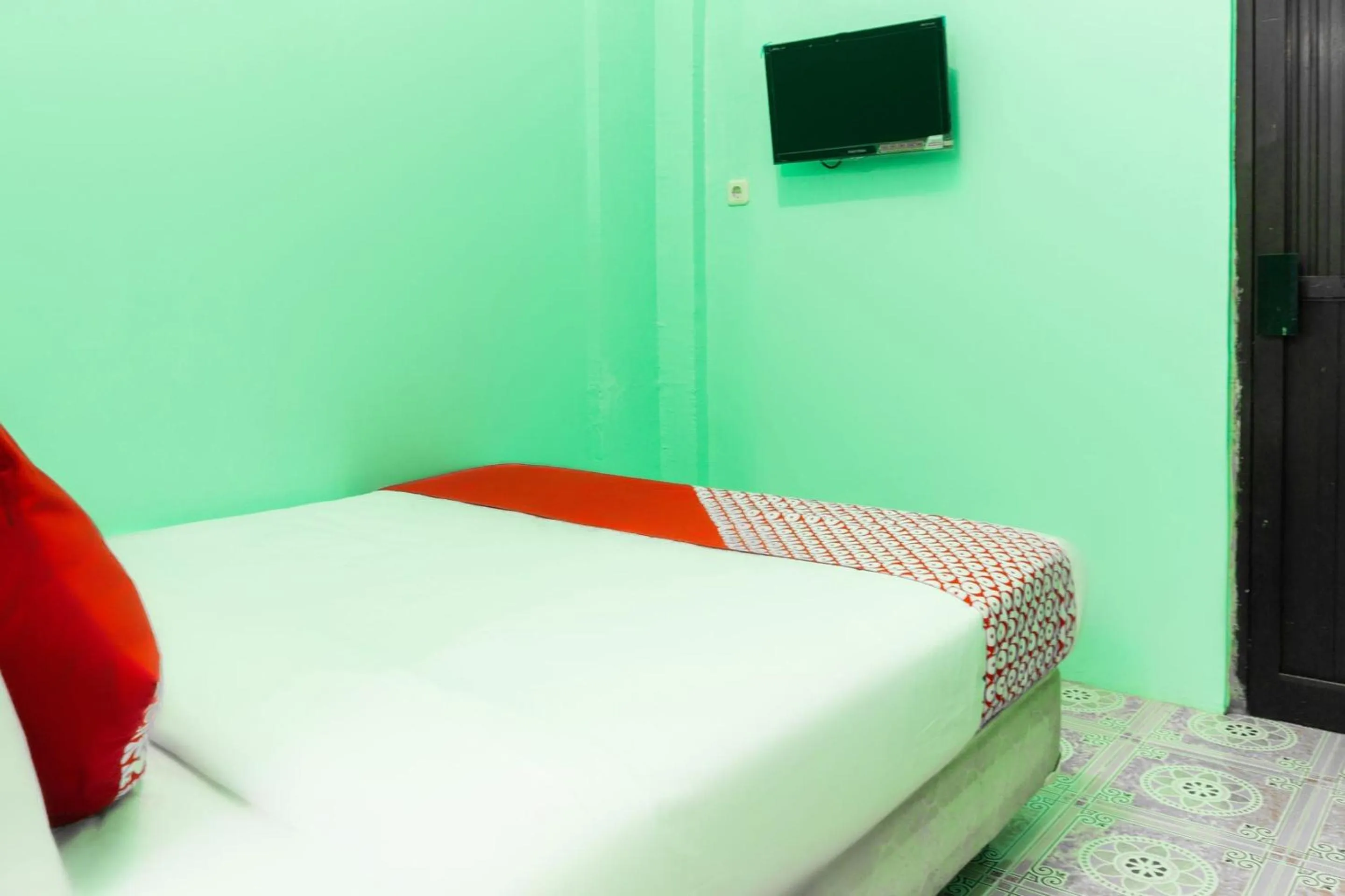 Bedroom, Bed in Hotel O Semarapura Homestay