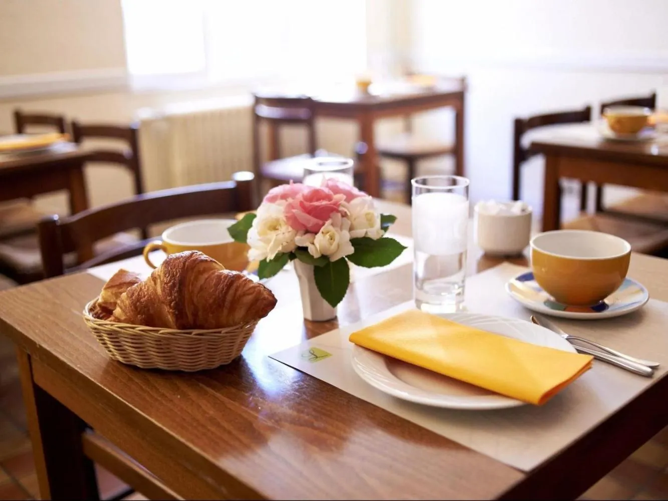 Continental breakfast in Logis Hôtel Le Pélican & son restaurant