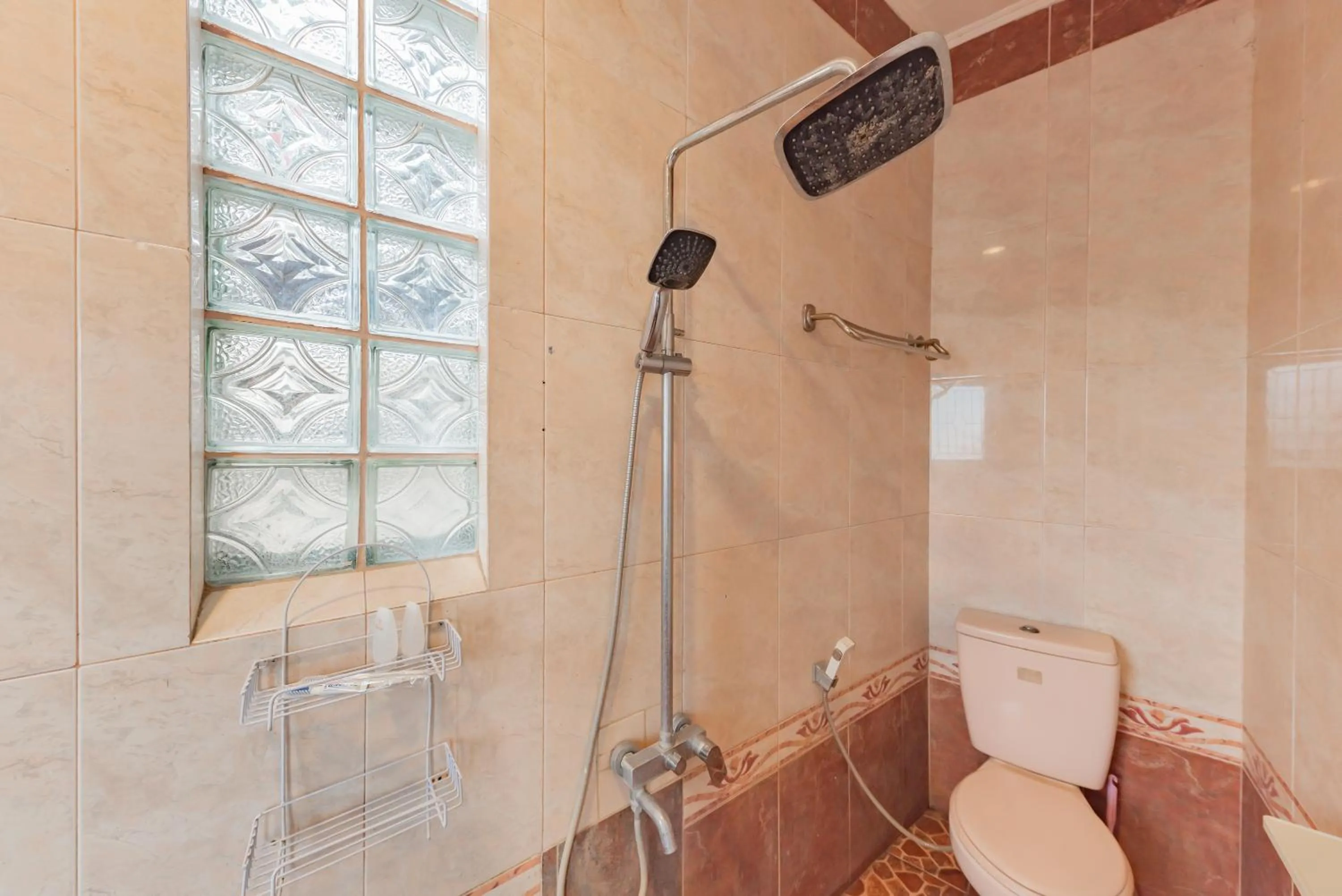 Bathroom in Urbanview Hotel Villa Surya Bandung