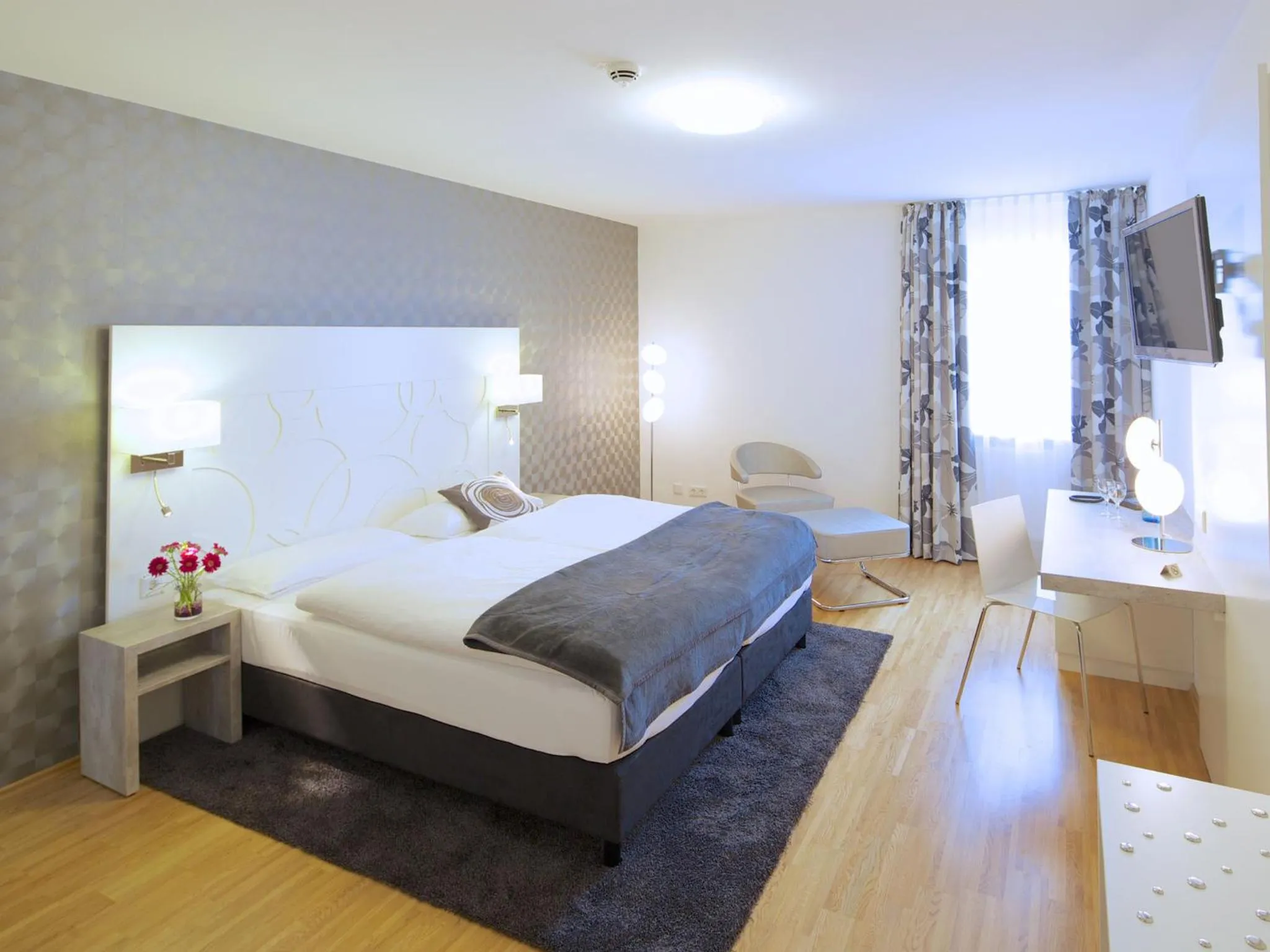 Bed in Hotel Karolinger Hof