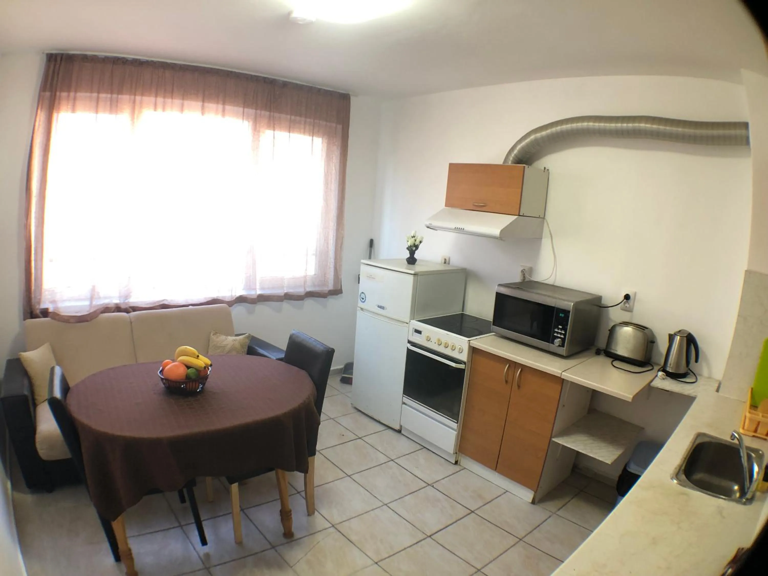 Kitchen or kitchenette in Samuil Apartments - Central Burgas