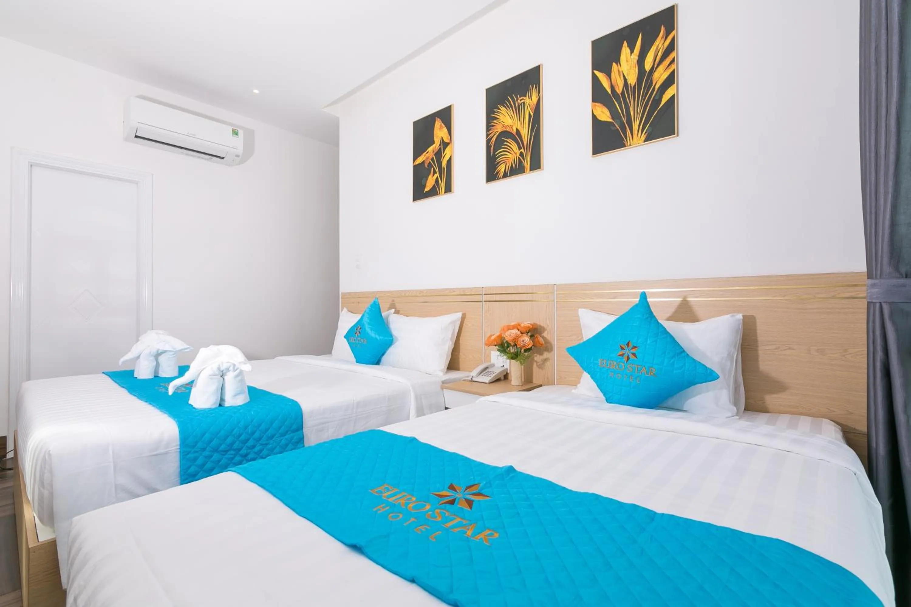 Bed in Euro Star Riverside Hotel