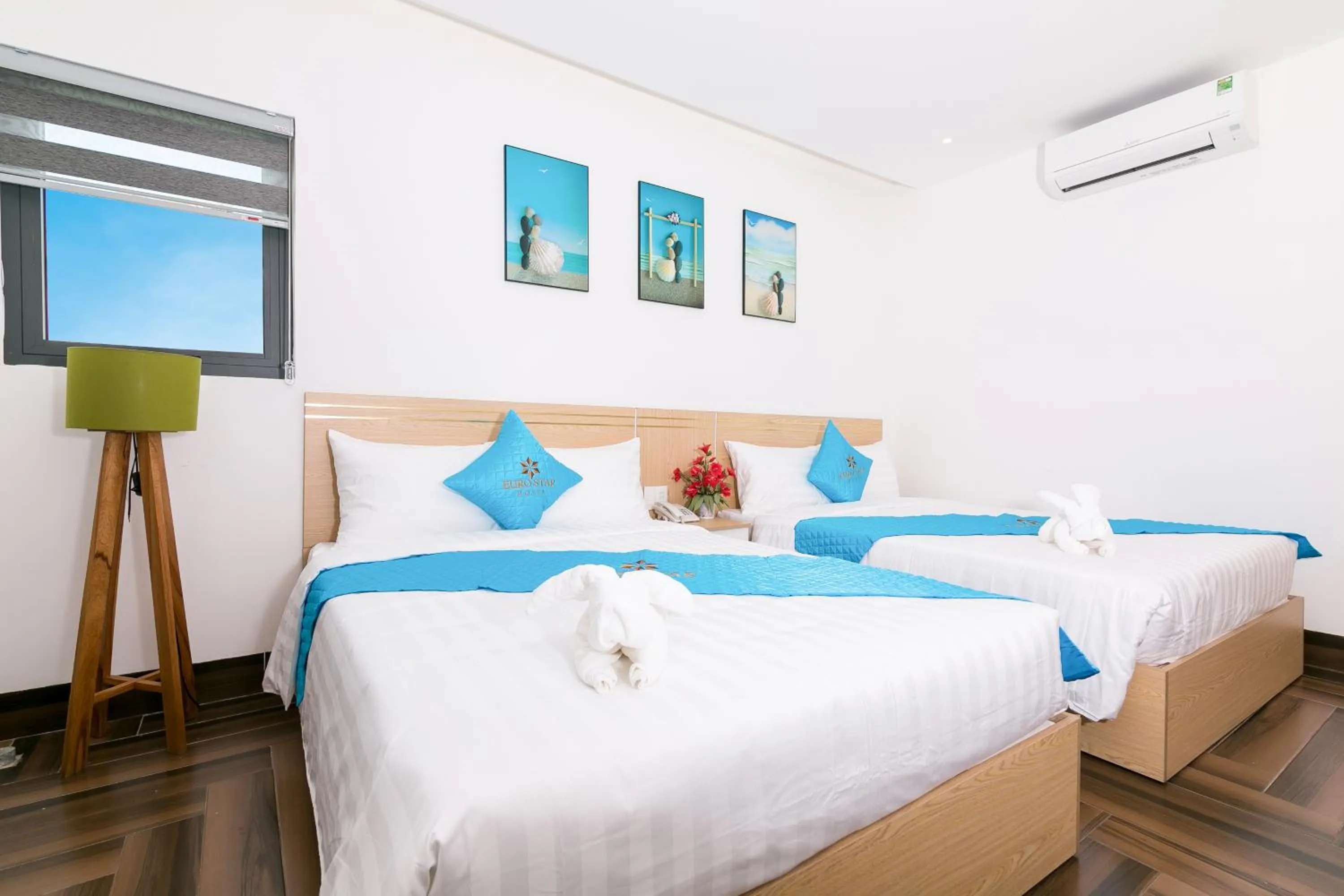 Bed in Euro Star Riverside Hotel