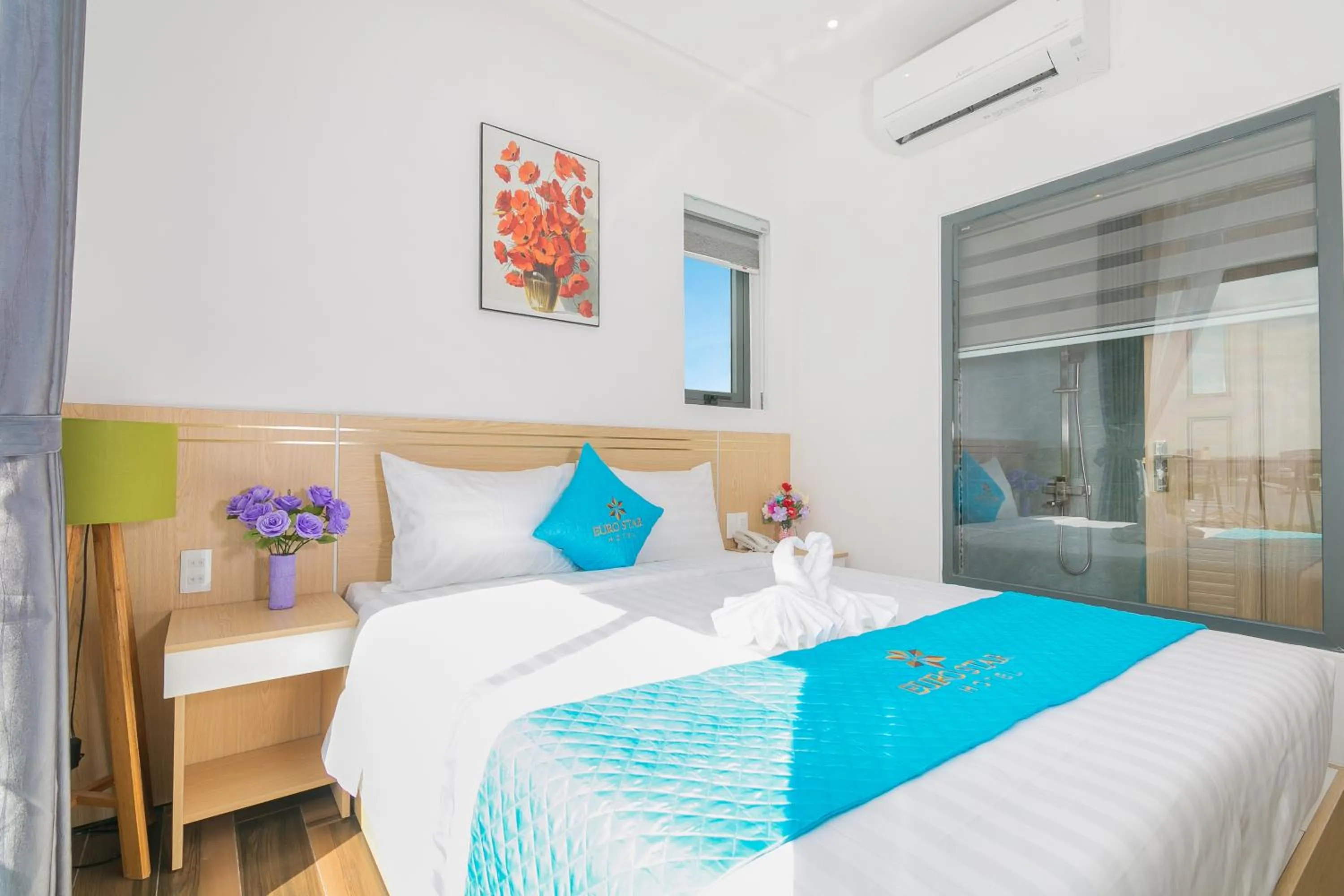 Bed in Euro Star Riverside Hotel