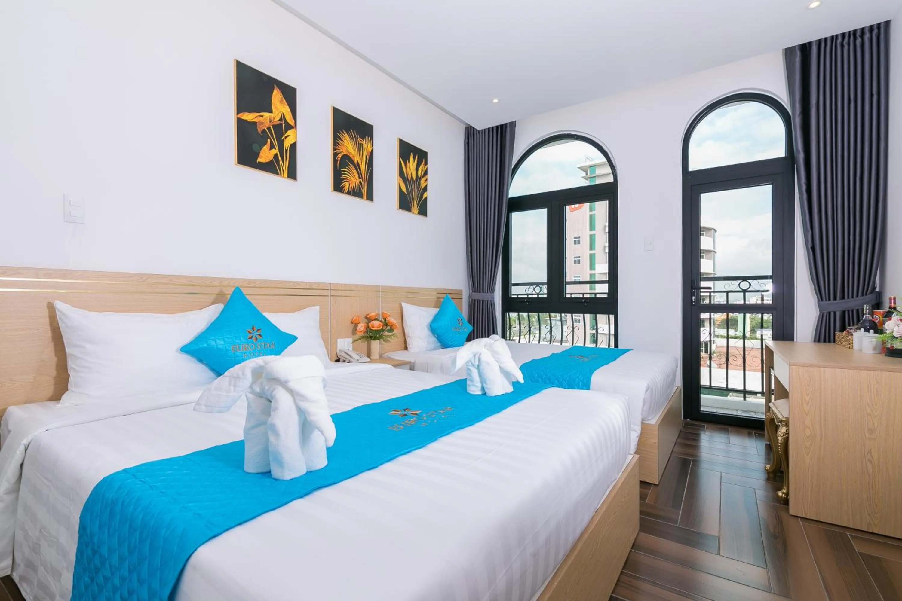 Bed in Euro Star Riverside Hotel