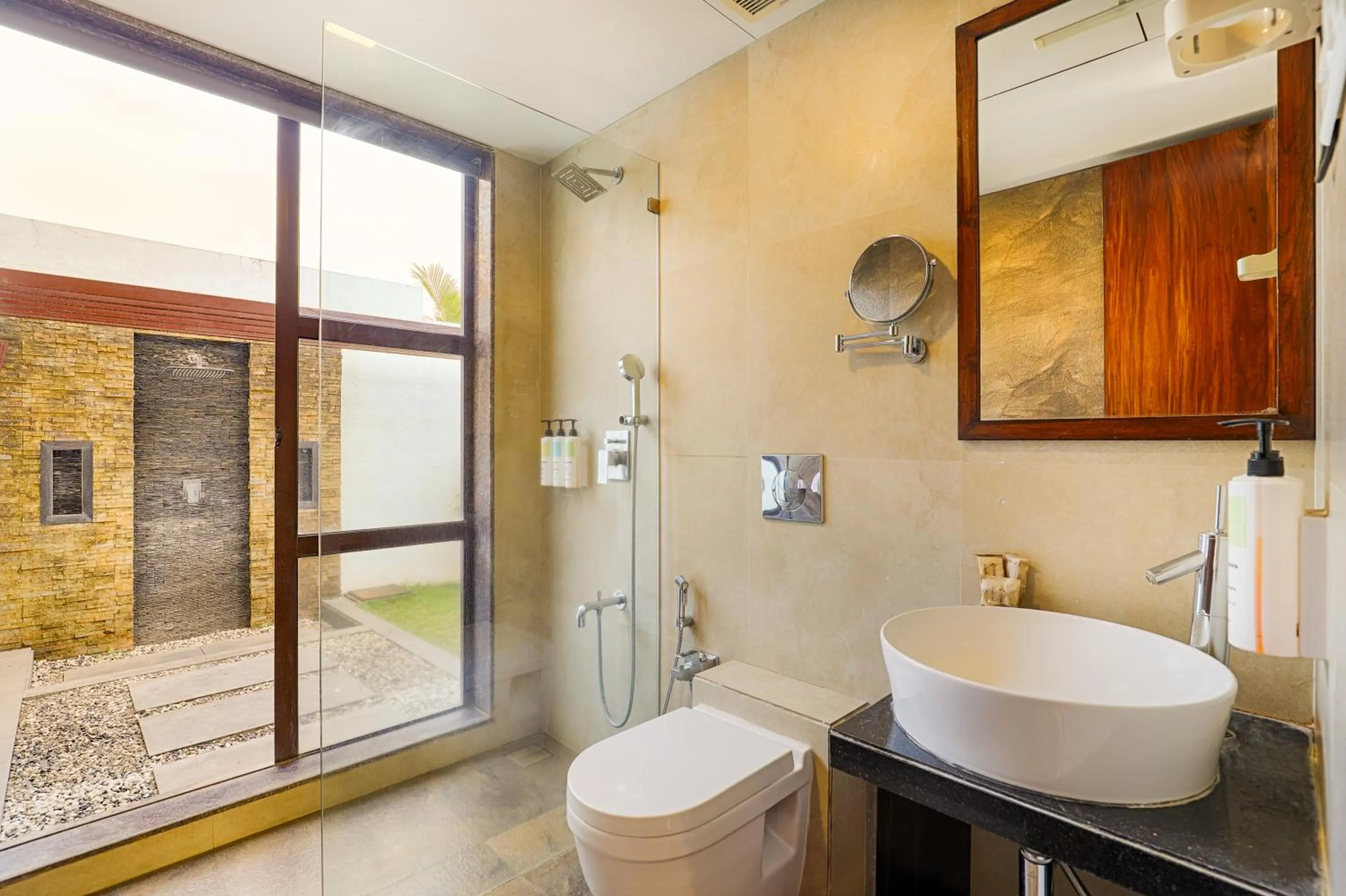 Shower in Tropicana Resort & Spa Alibaug, A Club Mahindra Associate