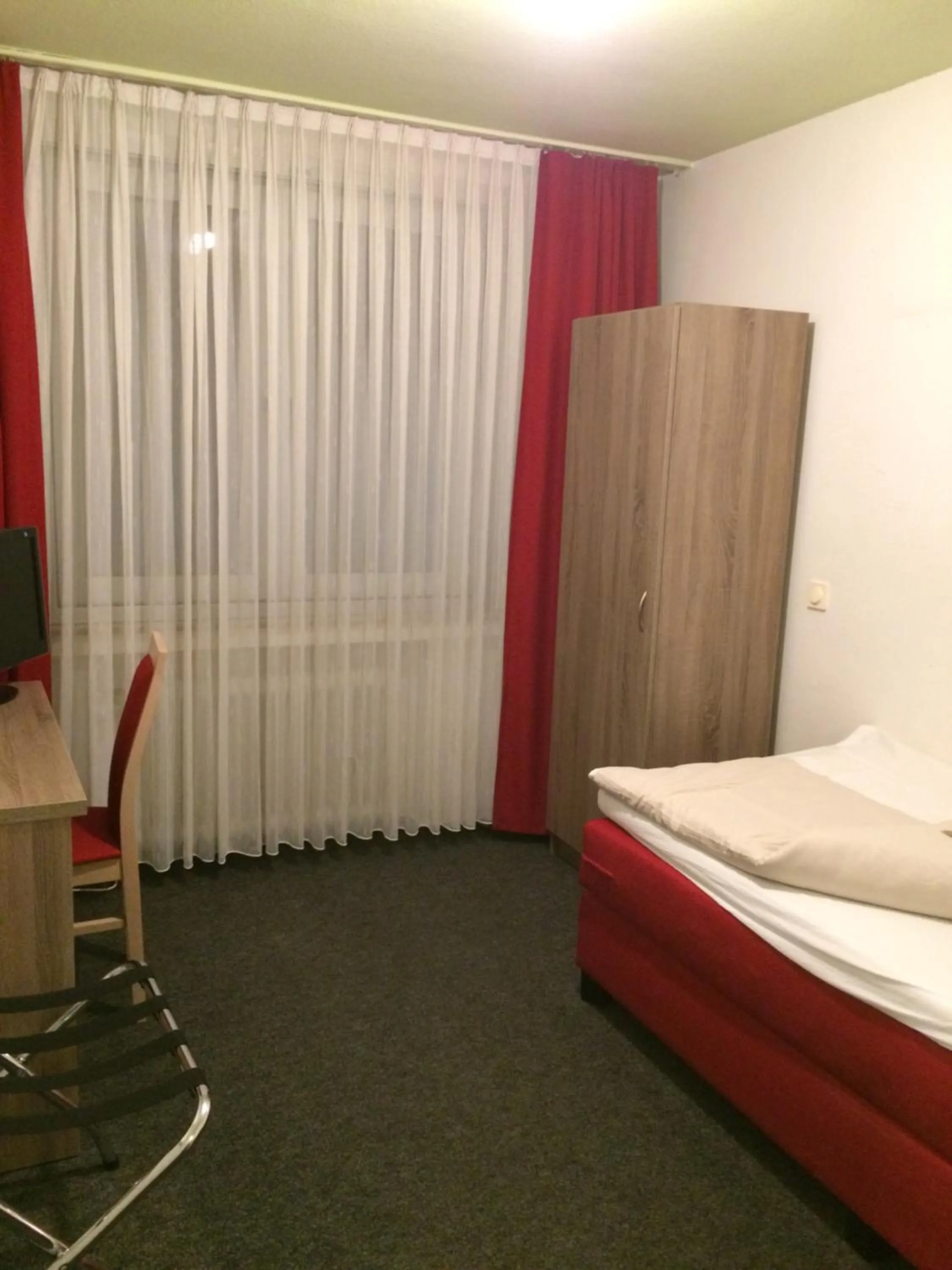 Photo of the whole room, Bed in Central Hotel