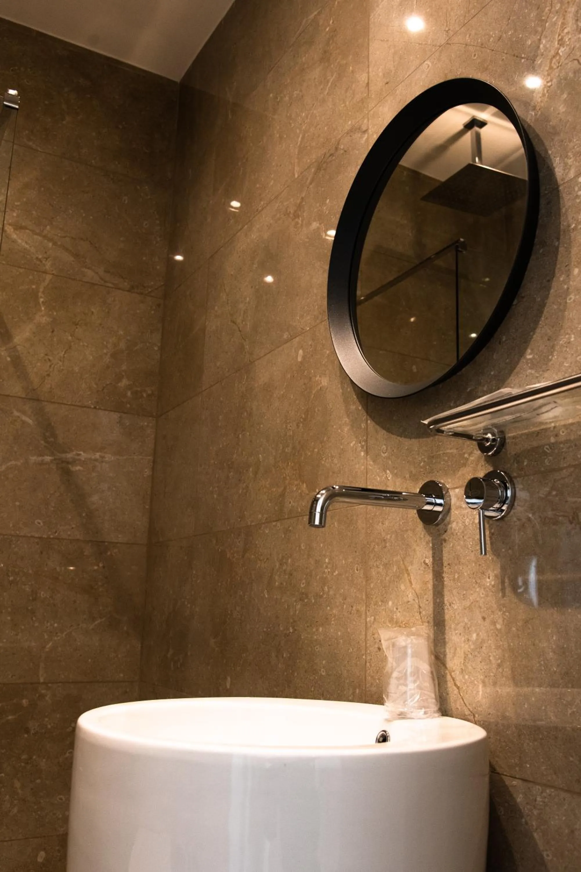 Bathroom in XXIV Domus Luxury Suites