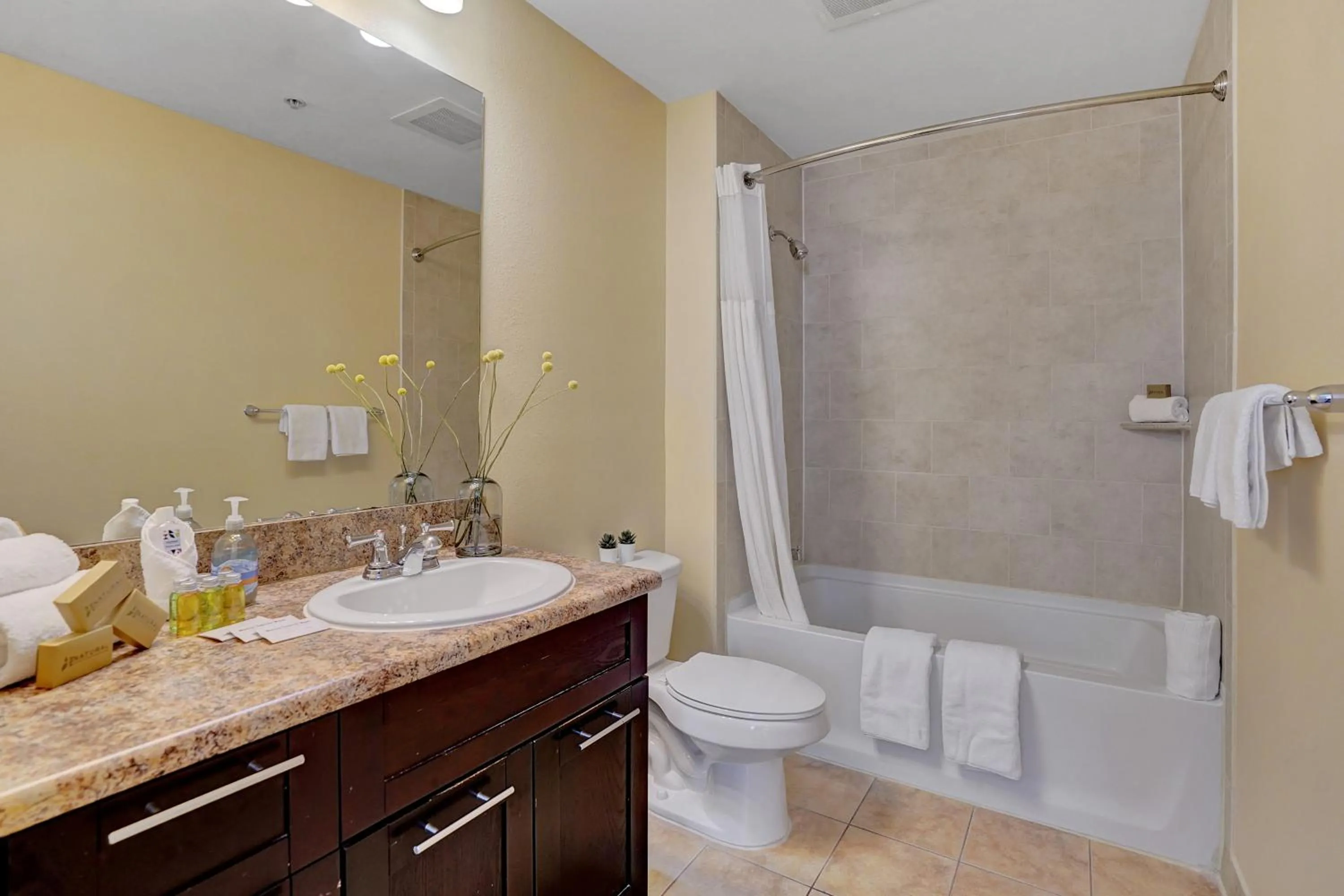 Bathroom in Dharma Home Suites South Miami at Red Road Commons