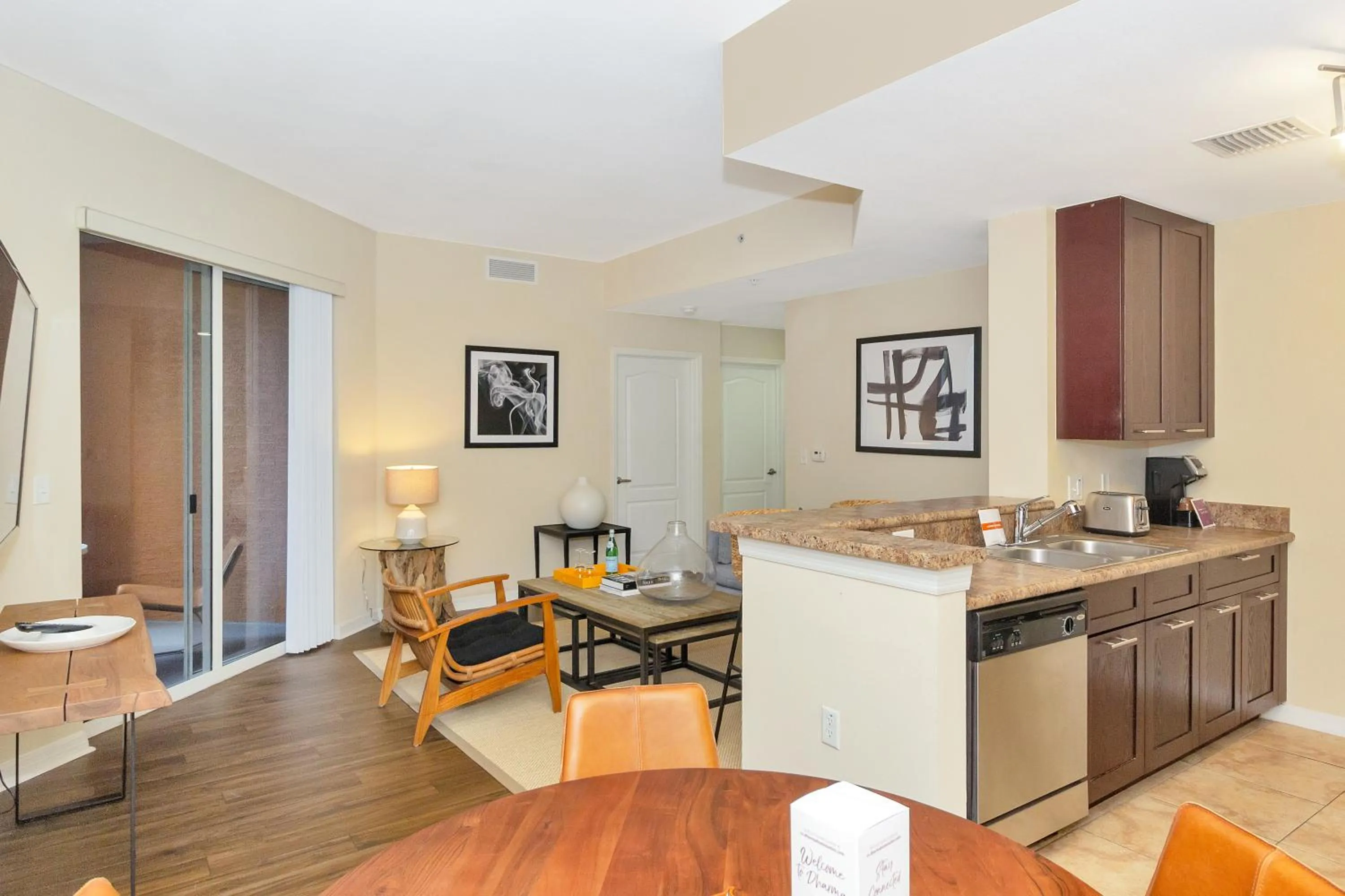 Kitchen or kitchenette in Dharma Home Suites South Miami at Red Road Commons