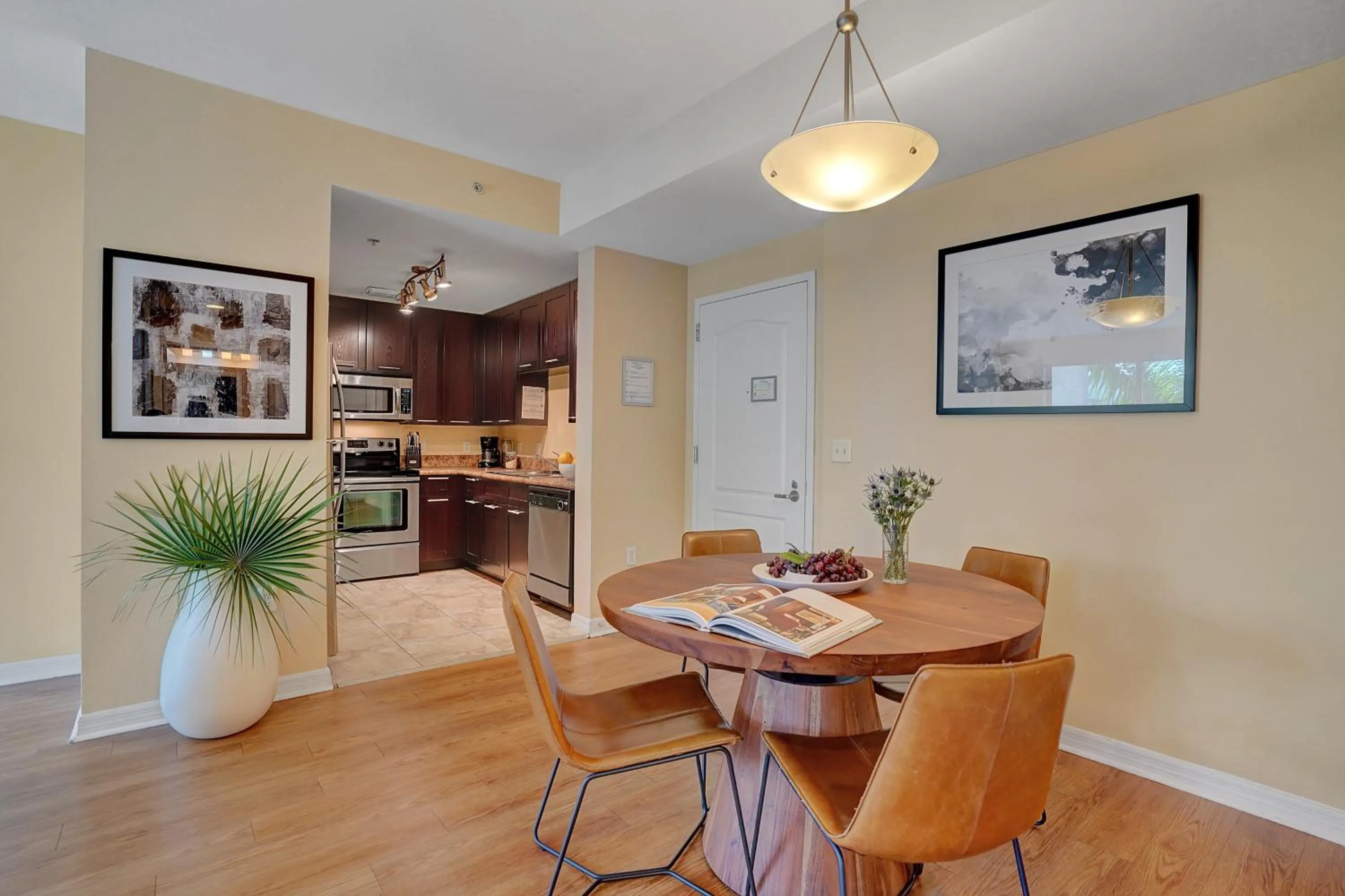 Kitchen or kitchenette in Dharma Home Suites South Miami at Red Road Commons